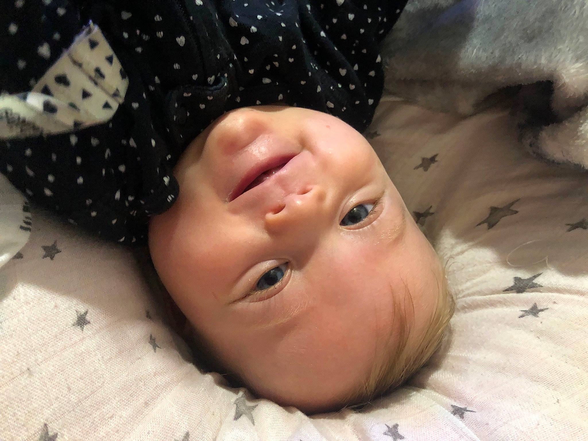 Eva is registered to the contest to win money with this photo: baby, baby_toddler_clothing, carmine, cheek, child, eyelash, fashion_accessory, fun, grass, hair_accessory, happy, headgear, linens, lip, nose, pattern, people_in_nature, person, portrait_photography, smile