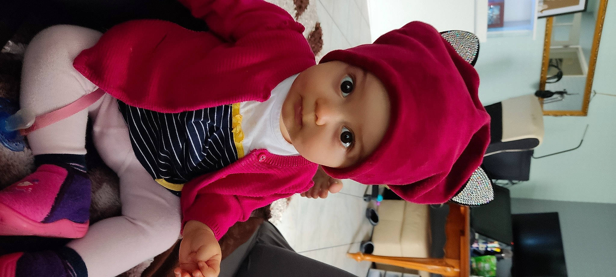 Atavwigho Hanna participe au concours pour gagner de l'argent avec cette photo : baby, baby_toddler_clothing, cheek, child, fun, happy, headgear, headwear, jacket, lip, magenta, mouth, nose, person, pink, purple, skin, smile, snapshot, textile