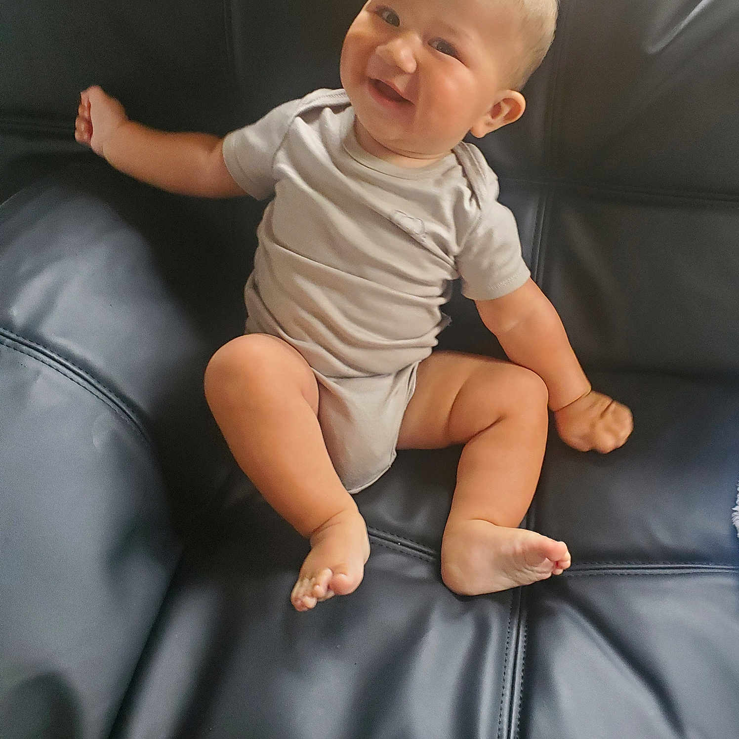 Zeke joined the competition — help win amazing prizes! baby, babylaughing, cushion, face, happy, head, homedecor, laughing, person, photography, portrait, sitting, smile