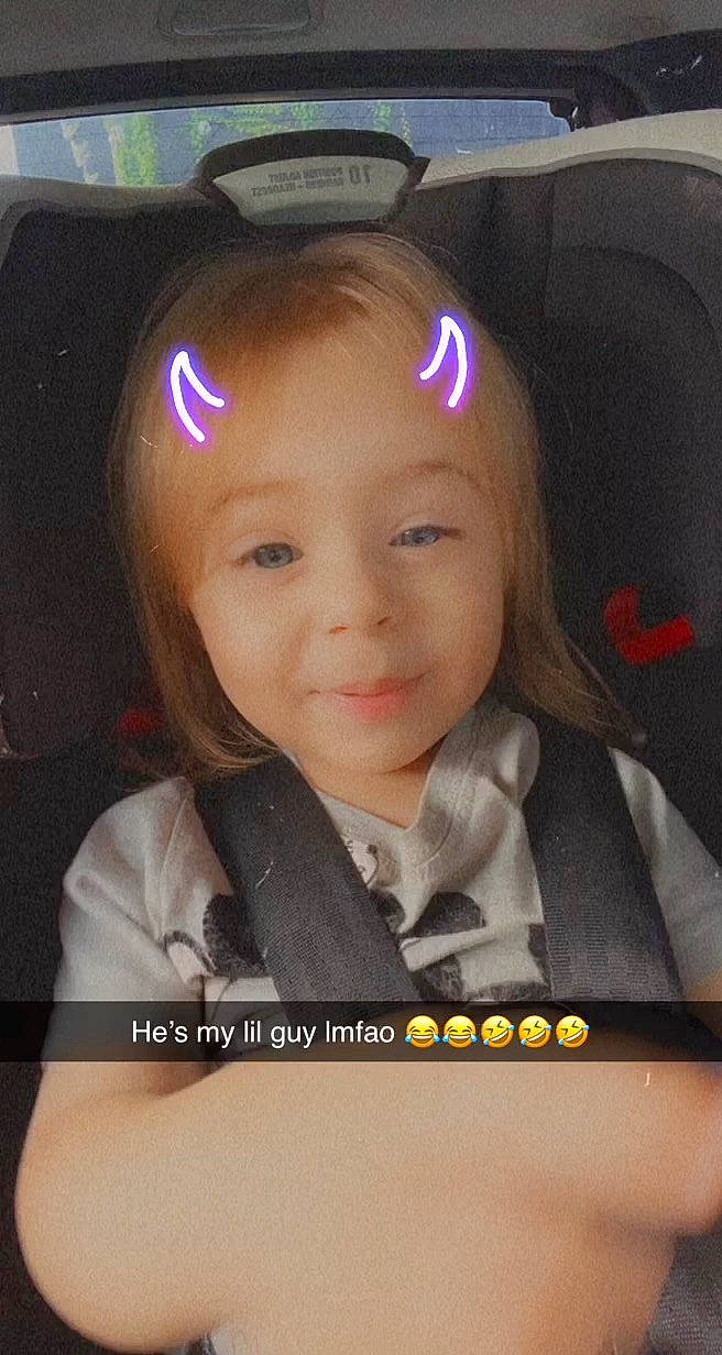 Alijah is registered to the contest to win money with this photo: car_seat, cheek, child, eyebrow, eyelash, eyewear, facial_expression, fashion_accessory, flash_photography, fun, hair_coloring, happy, iris, magenta, nose, person, photo_caption, selfie, smile, tie