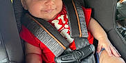 Brooks joined the competition — help win amazing prizes! baby, car_seat, child, smile, red_shirt, seatbelt, infant, drool, safety, cute, person, happy, indoors, closeup, restraint, young_child, car, seat, straps, comfort