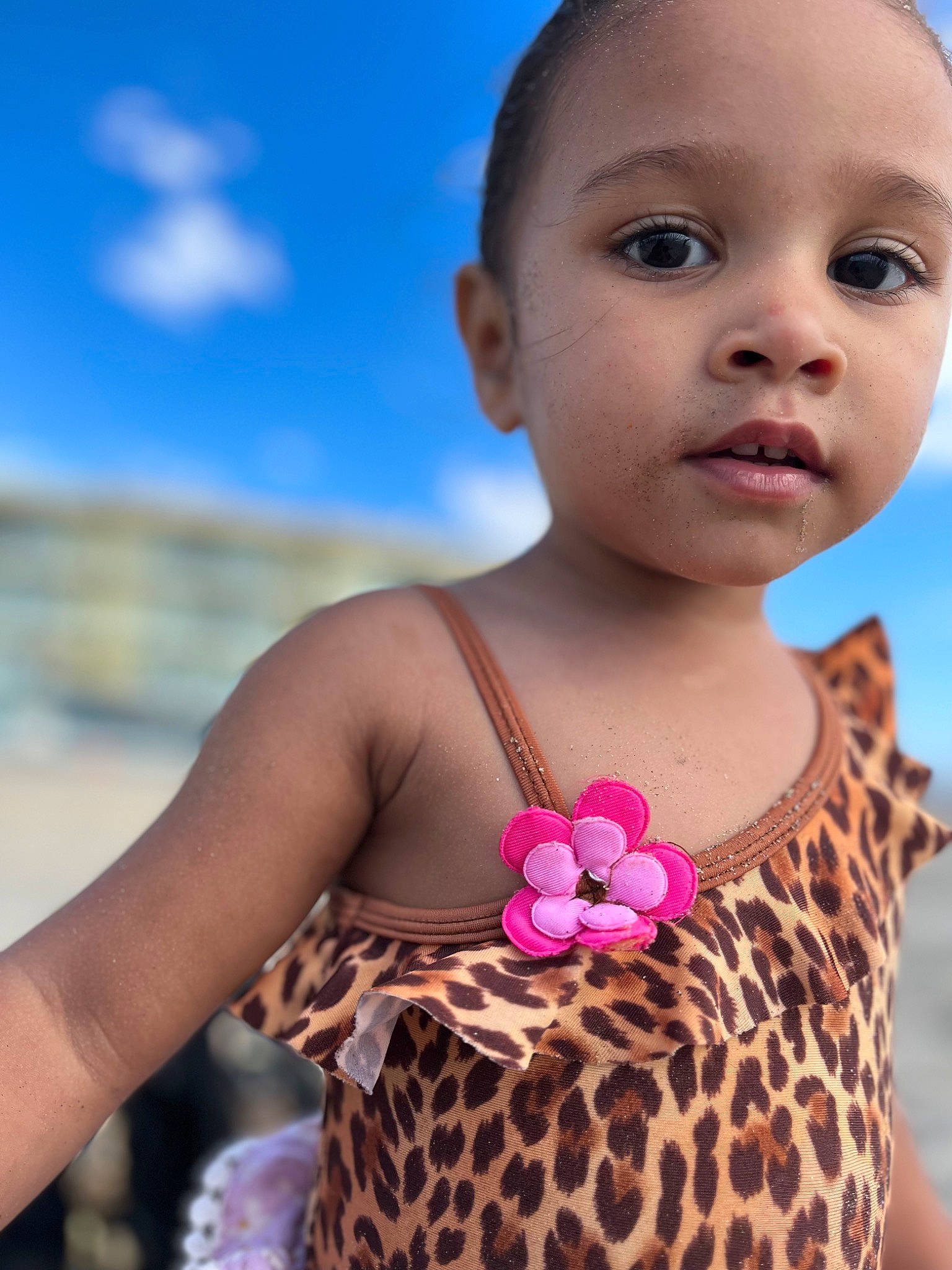 Richella is registered to the contest to win money with this photo: arm, baby_toddler_clothing, blue, cloud, dress, finger, hair, hairstyle, hand, happy, iris, joint, lip, neck, organ, person, pink, shoulder, skin, sky