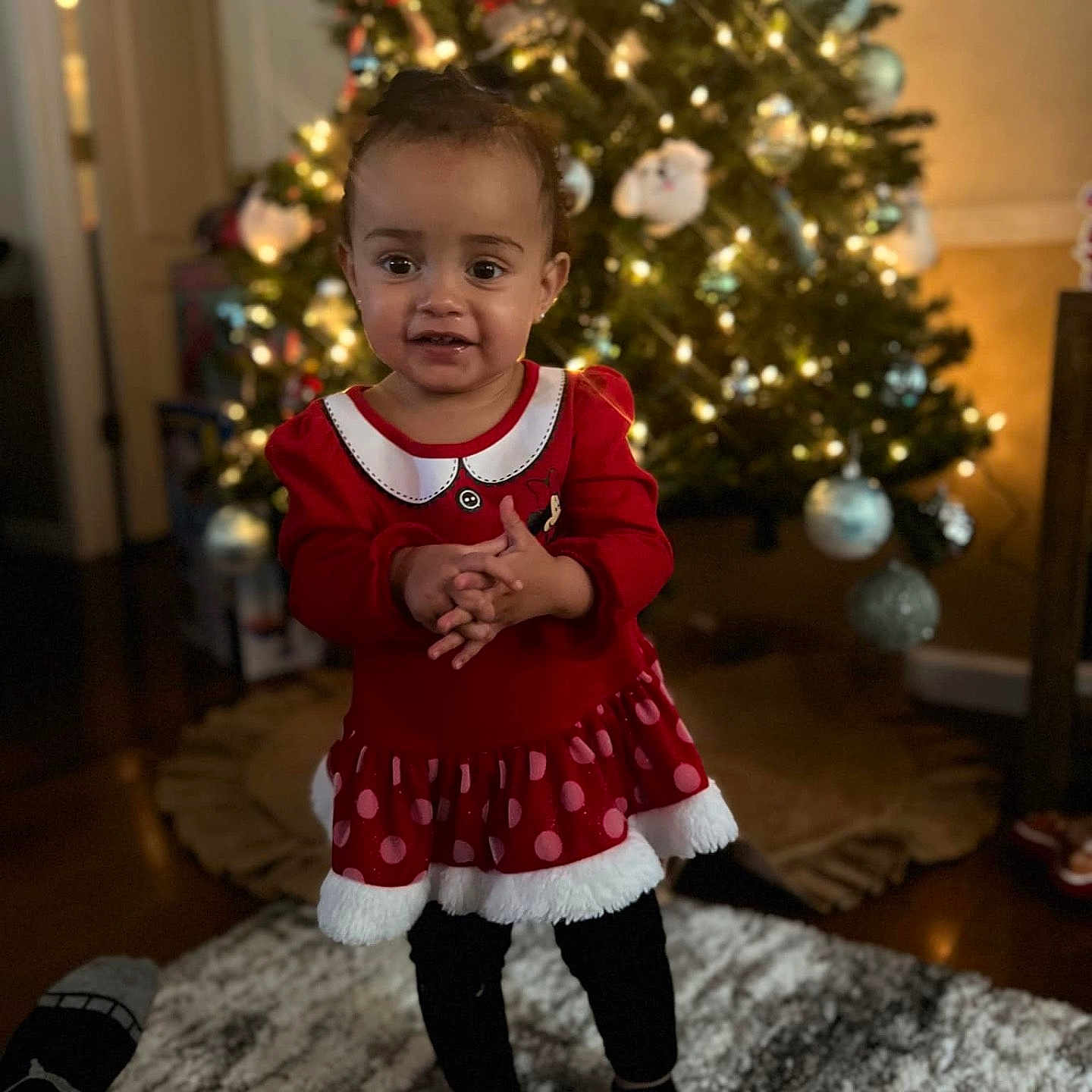 Kestynn is registered to the contest to win money with this photo: accessories, christmas, christmasdecorations, clothing, coat, costume, face, festival, happy, head, jewelry, lighting, necklace, person, photography, plant, portrait, sitting, smile, tree