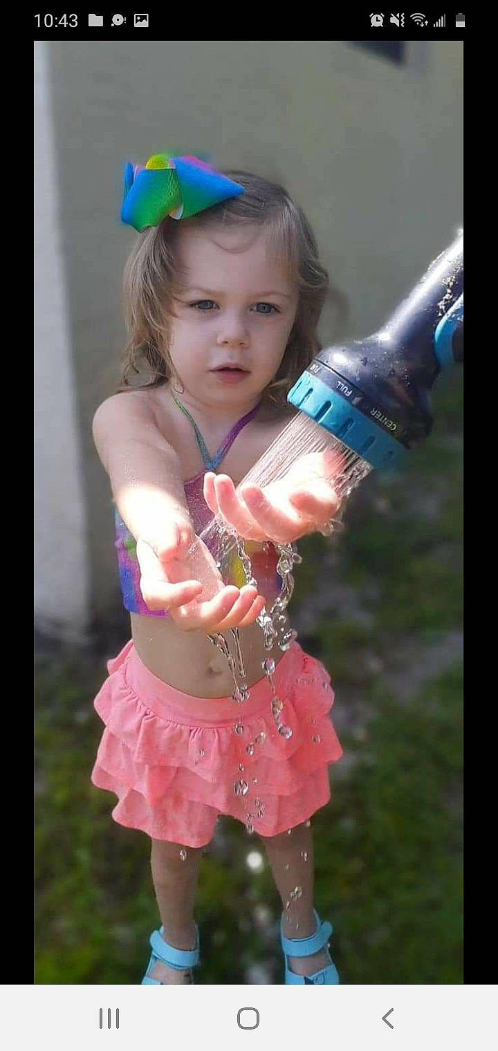 Luna Rae joined the competition — help win amazing prizes! baby_toddler_clothing, blue, bottle, child, costume, drinking, drinkware, event, fashion_accessory, fun, glass, happy, jewellery, magenta, nail, person, pink, plastic_bottle, thumb, toddler
