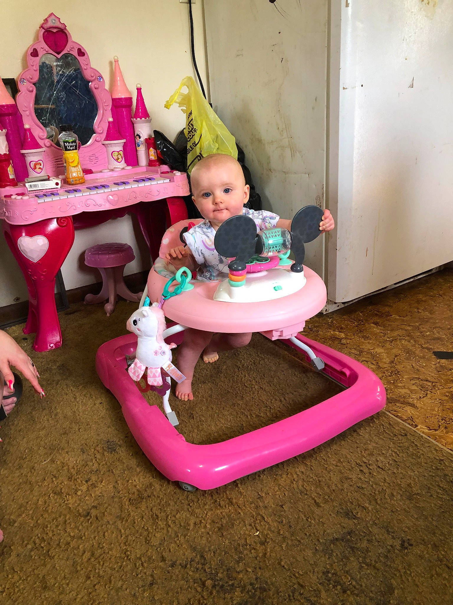 Scarlett is registered to the contest to win money with this photo: baby, baby_products, baby_toys, bag, carmine, chair, child, event, flooring, fun, leisure, magenta, party_supply, person, pink, purple, riding_toy, sitting, stuffed_toy, toddler
