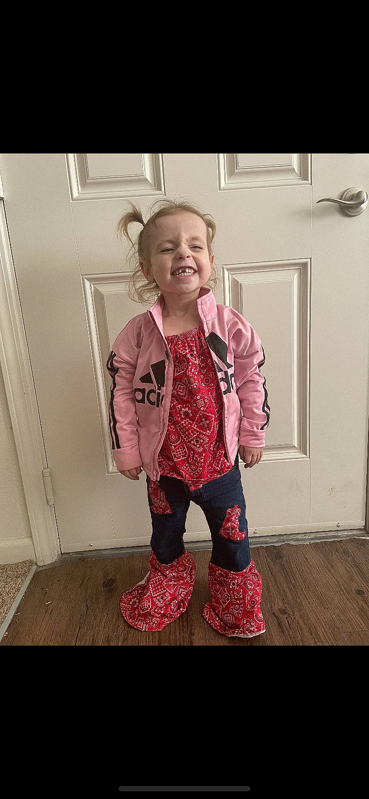 Chevelle joined the competition — help win amazing prizes! baby_toddler_clothing, child, fashion_design, happy, human_body, joy, knee, magenta, neck, outerwear, pattern, person, pink, shoulder, sleeve, smile, sock, standing, thigh, toddler