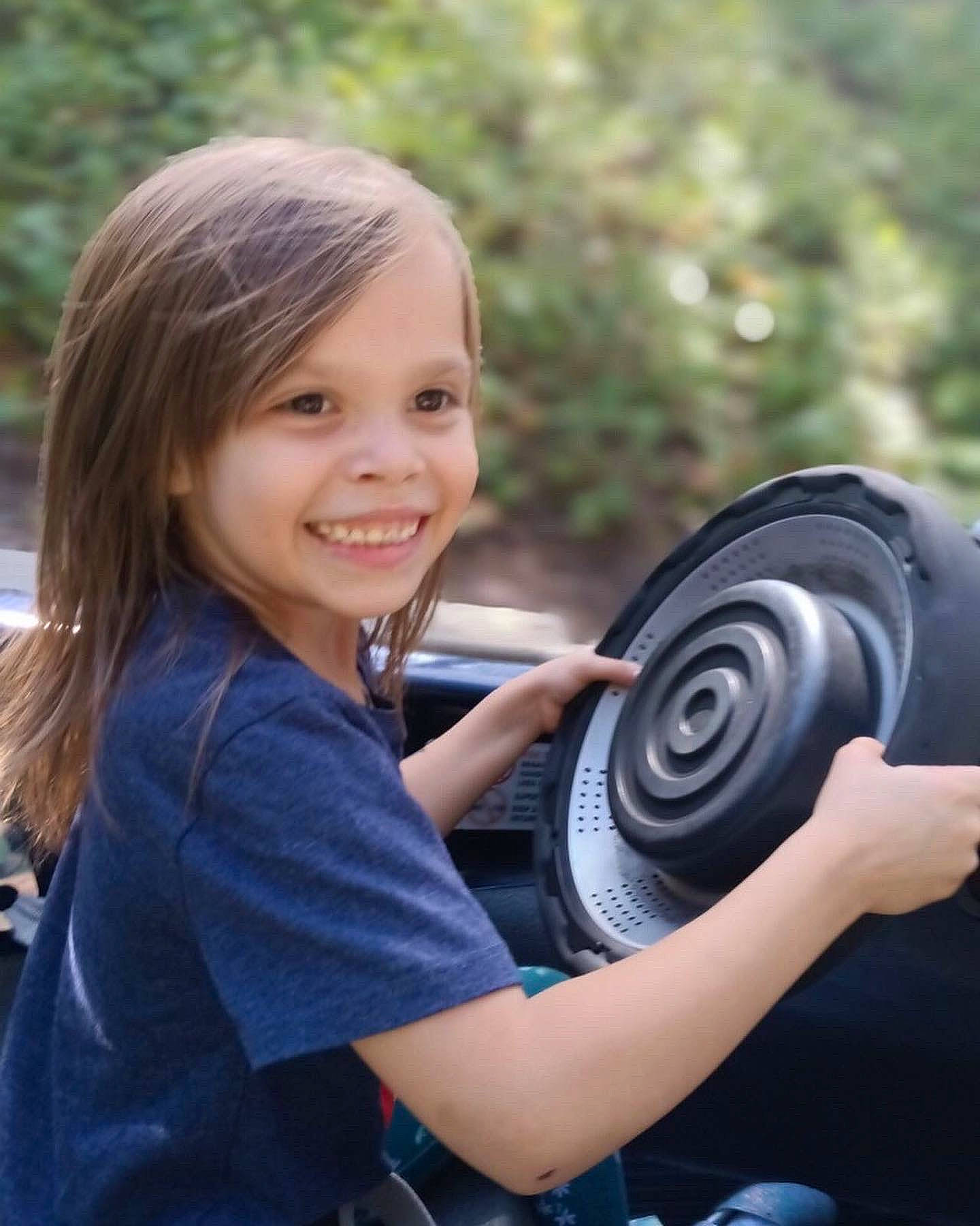 Maddison joined the competition — help win amazing prizes! automotive_design, automotive_tire, automotive_wheel_system, camera_lens, cameras_optics, door, eye, flash_photography, fun, grass, happy, joy, leisure, motor_vehicle, person, plant, recreation, rim, smile, steering_wheel