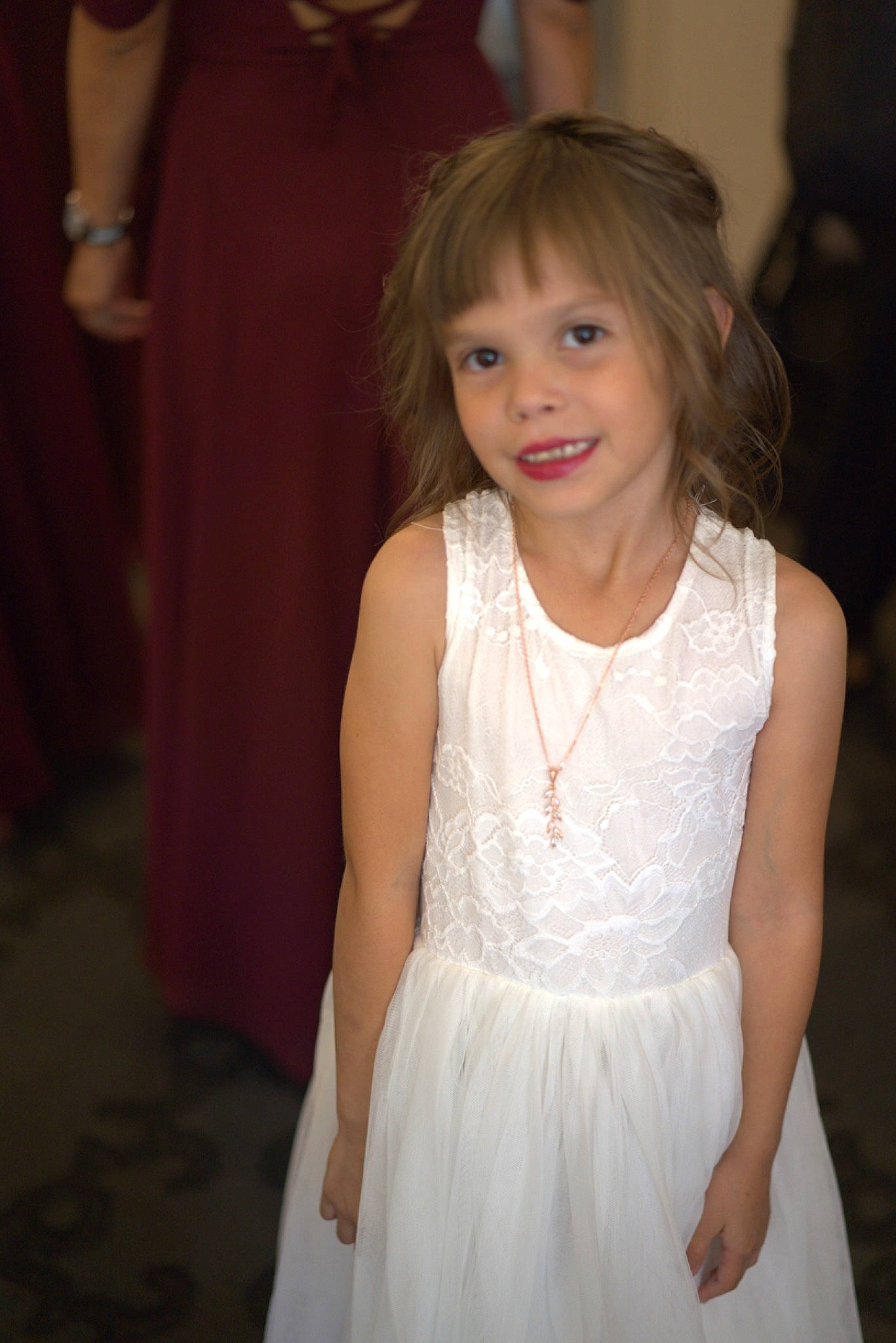 Maddison is registered to the contest to win money with this photo: bridal_clothing, bridal_party_dress, dress, embellishment, fashion, flash_photography, flooring, formal_wear, fun, gown, hair, hairstyle, happy, head, iris, joint, joy, outerwear, person, smile