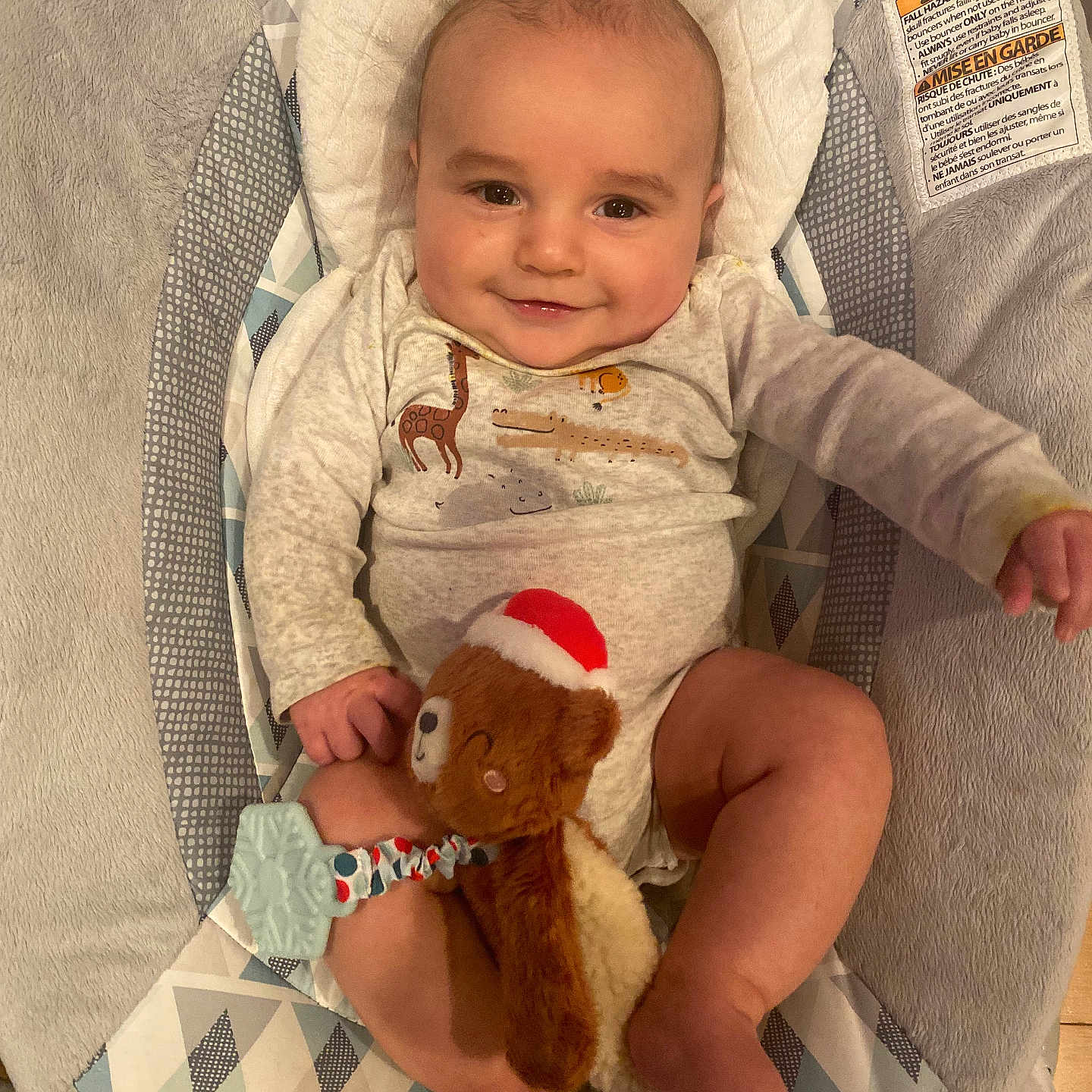 Brooks is registered to the contest to win money with this photo: baby, bed, chair, clothing, couch, crib, cushion, face, furniture, hat, head, homedecor, newborn, person, photography, plush, portrait, quilt, sitting, toy