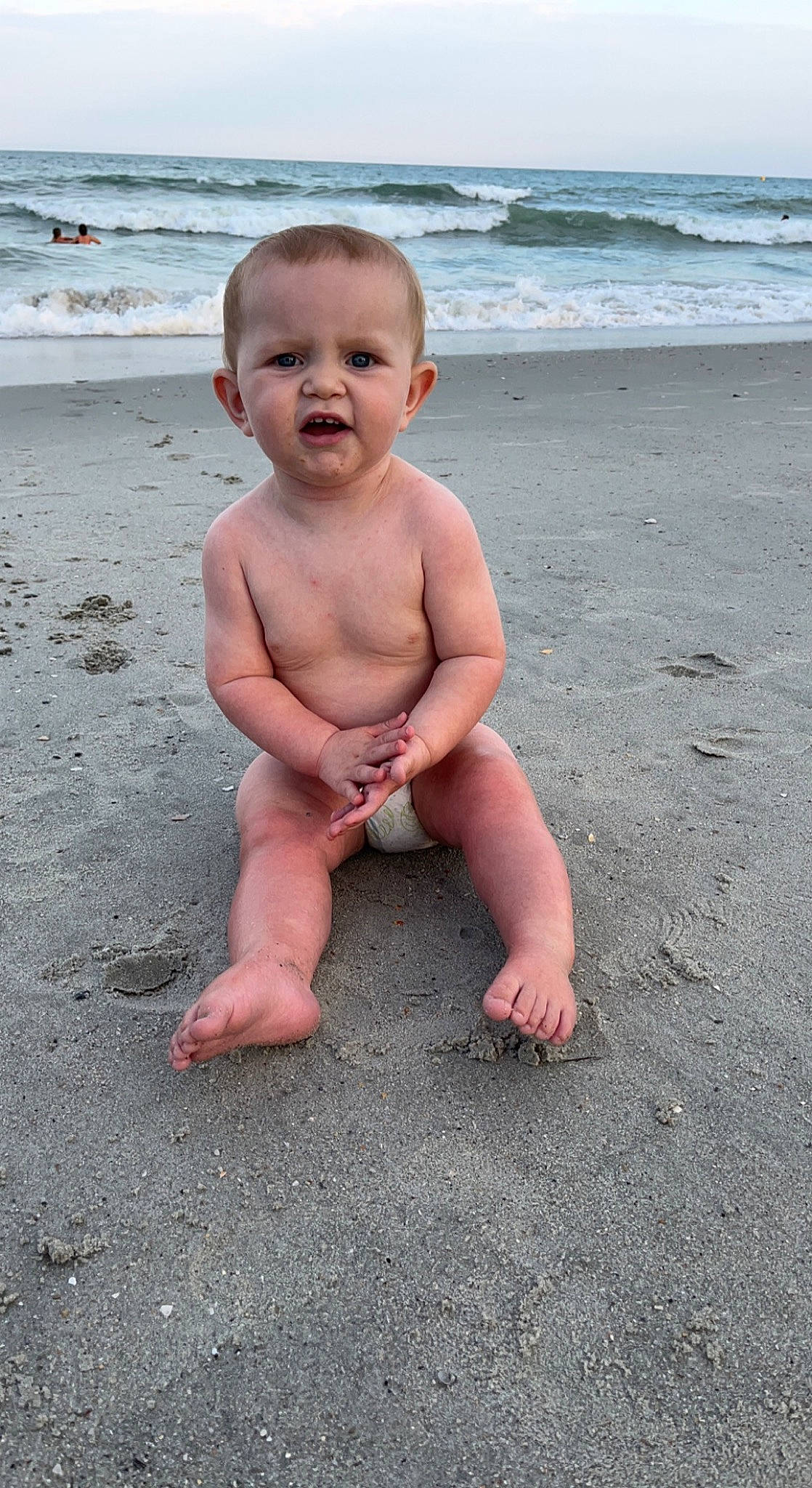 Gunnar joined the competition — help win amazing prizes! arm, baby, barechested, barefoot, beach, chest, child, foot, fun, happy, head, human_leg, leg, leisure, people_in_nature, people_on_beach, person, sky, thumb, toddler