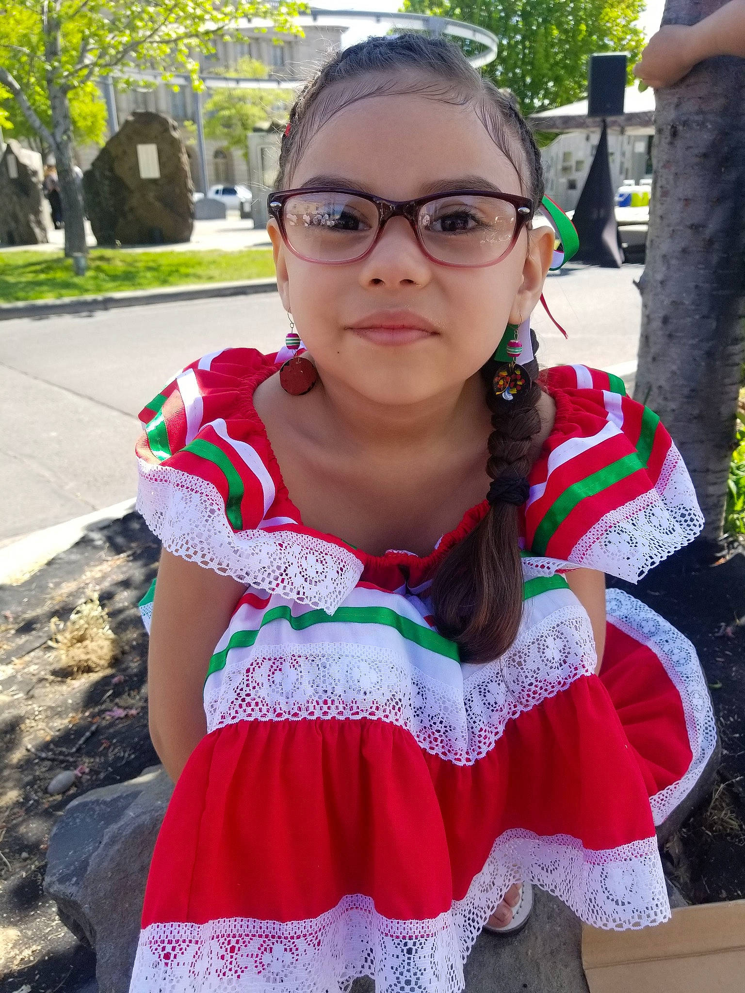 Nariah is registered to the contest to win money with this photo: costume, dress, eyewear, fashion_accessory, glasses, person, smile, textile, vision_care