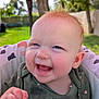 Lily joined the competition — help win amazing prizes! baby, infant, smile, happy, outdoor, greenery, tree, teether, clothing, pink, gray, seat, child, portrait, cute, red_hair, grass, sunlight, face, closeup