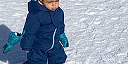 Kessim participe au concours pour gagner de l'argent avec cette photo : boots, child, clothing, cold, cold_weather, footprints, mittens, nature, outdoor, person, serious_expression, shadow, snow, snowsuit, snowy_ground, sunlight, walking, winter, winter_clothing, young_child