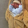 newborn, baby, infant, sleeping, onesie, bear_costume, hat, blanket, soft_texture, cozy, cute, child, indoor, resting, face, hands, clothing, warm, toddler, person
