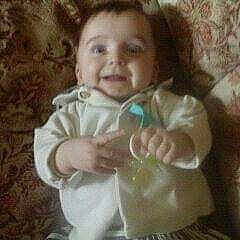 Esteban participe au concours pour gagner de l'argent avec cette photo : art, baby, baby_toddler_clothing, cheek, child, face, facial_expression, finger, fun, gesture, happy, joy, laugh, nose, person, photo_caption, sitting, sleeve, smile, thumb