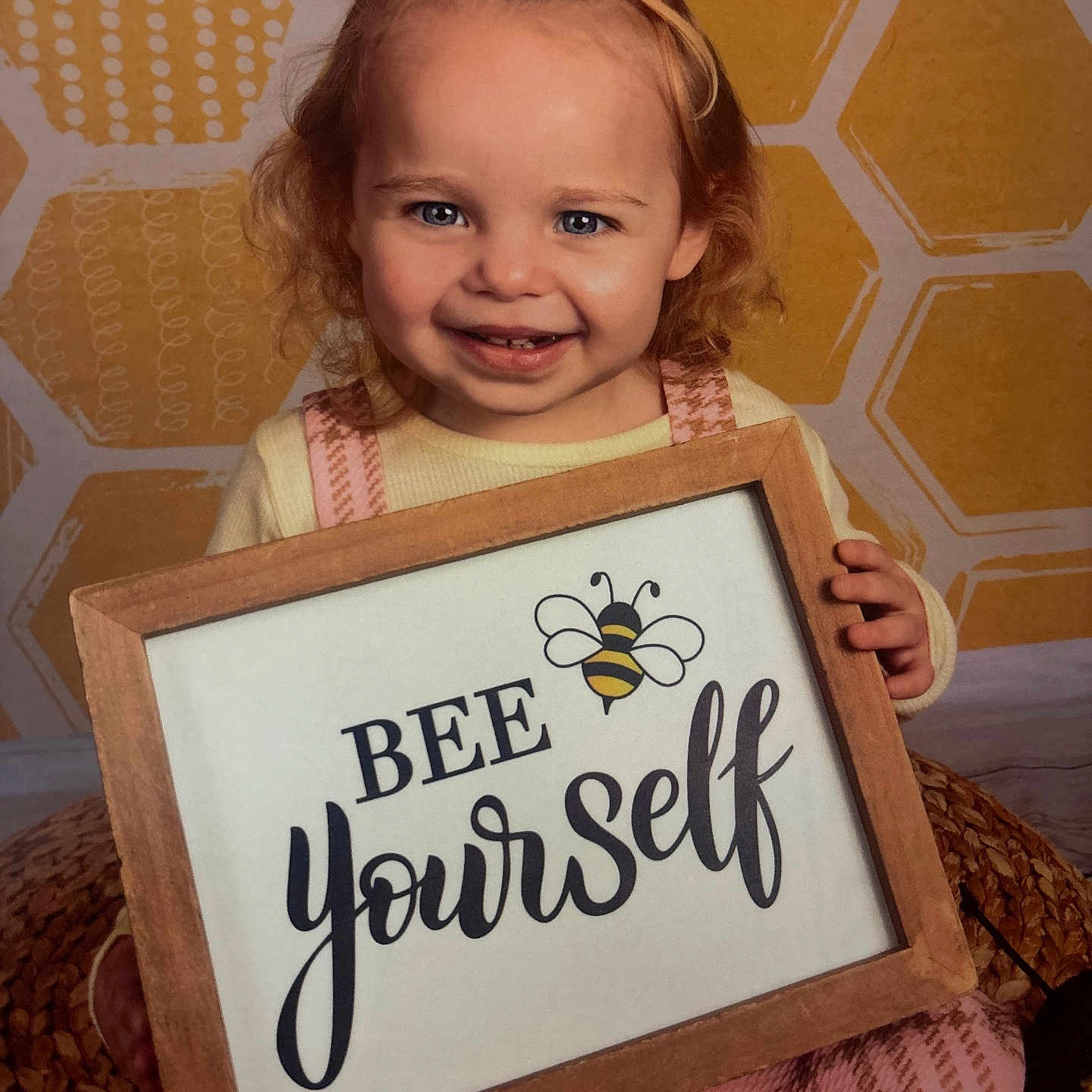Katalina is registered to the contest to win money with this photo: baby, blonde, bodypart, clothing, dress, face, hair, handwriting, happy, head, laughing, mouth, person, photoframe, photography, portrait, sitting, smile, teeth, text