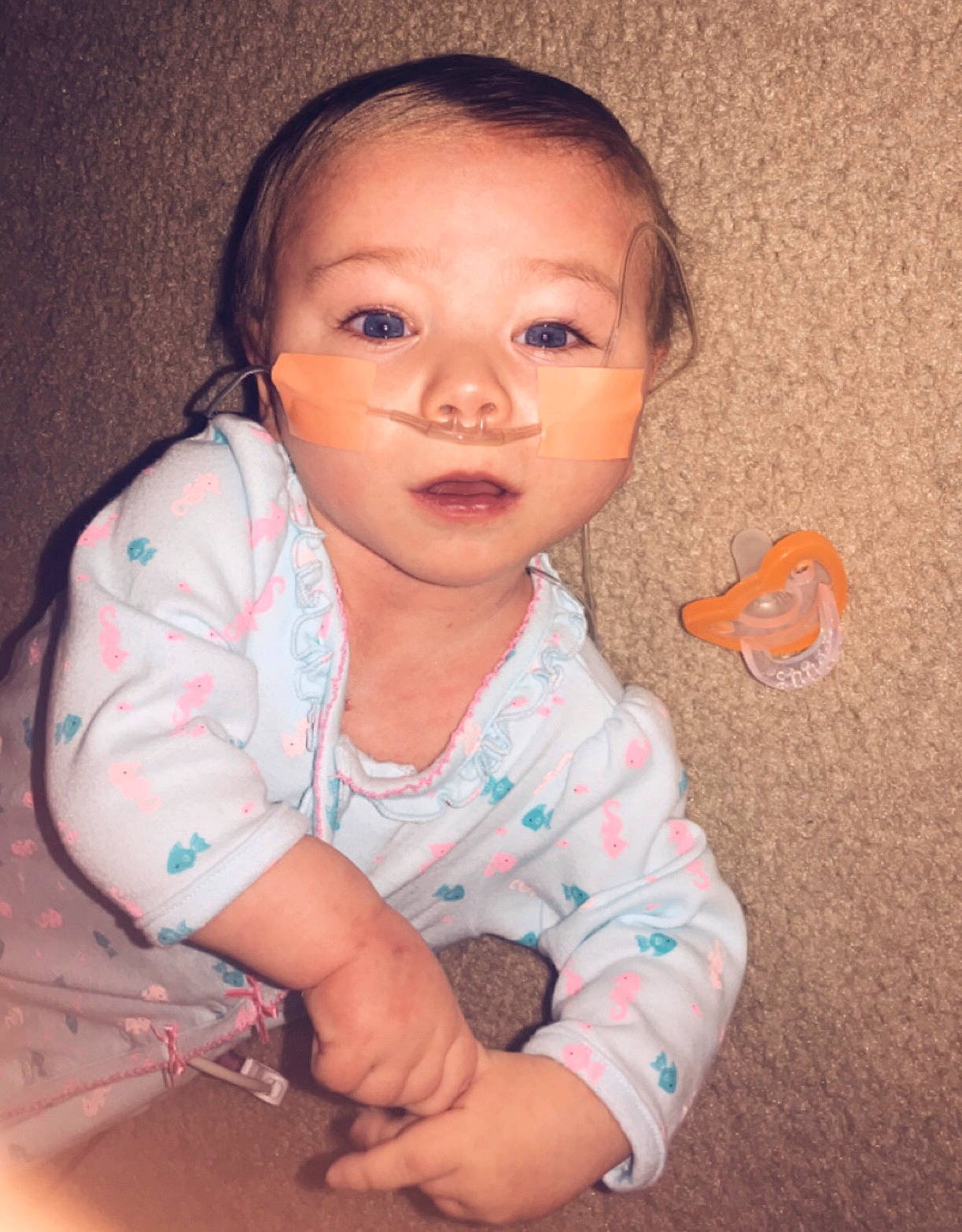 Della is registered to the contest to win money with this photo: baby, beauty, cheek, child, chin, eye, face, facial_expression, forehead, fun, happy, head, iris, lip, nose, person, portrait, sitting, skin, smile