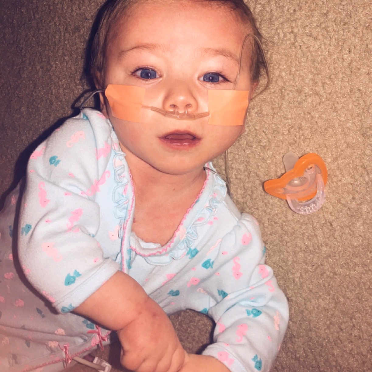 Della is registered to the contest to win money with this photo: baby, beauty, cheek, child, chin, eye, face, facial_expression, forehead, fun, happy, head, iris, lip, nose, person, portrait, sitting, skin, smile