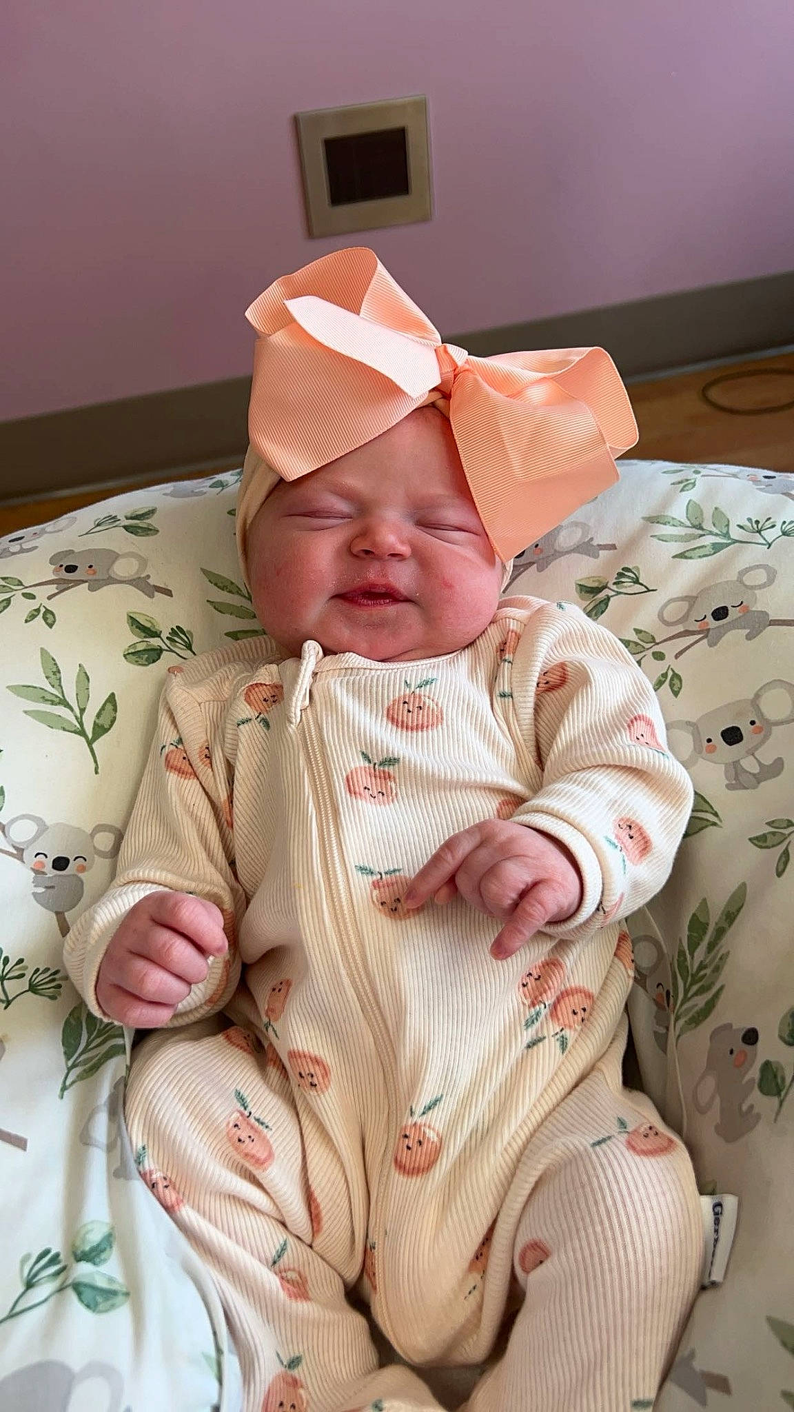 Everleigh is registered to the contest to win money with this photo: baby, baby_products, baby_safety, baby_toddler_clothing, cheek, child, comfort, face, hat, head, headwear, linens, pattern, peach, person, pink, room, skin, sleeve, textile