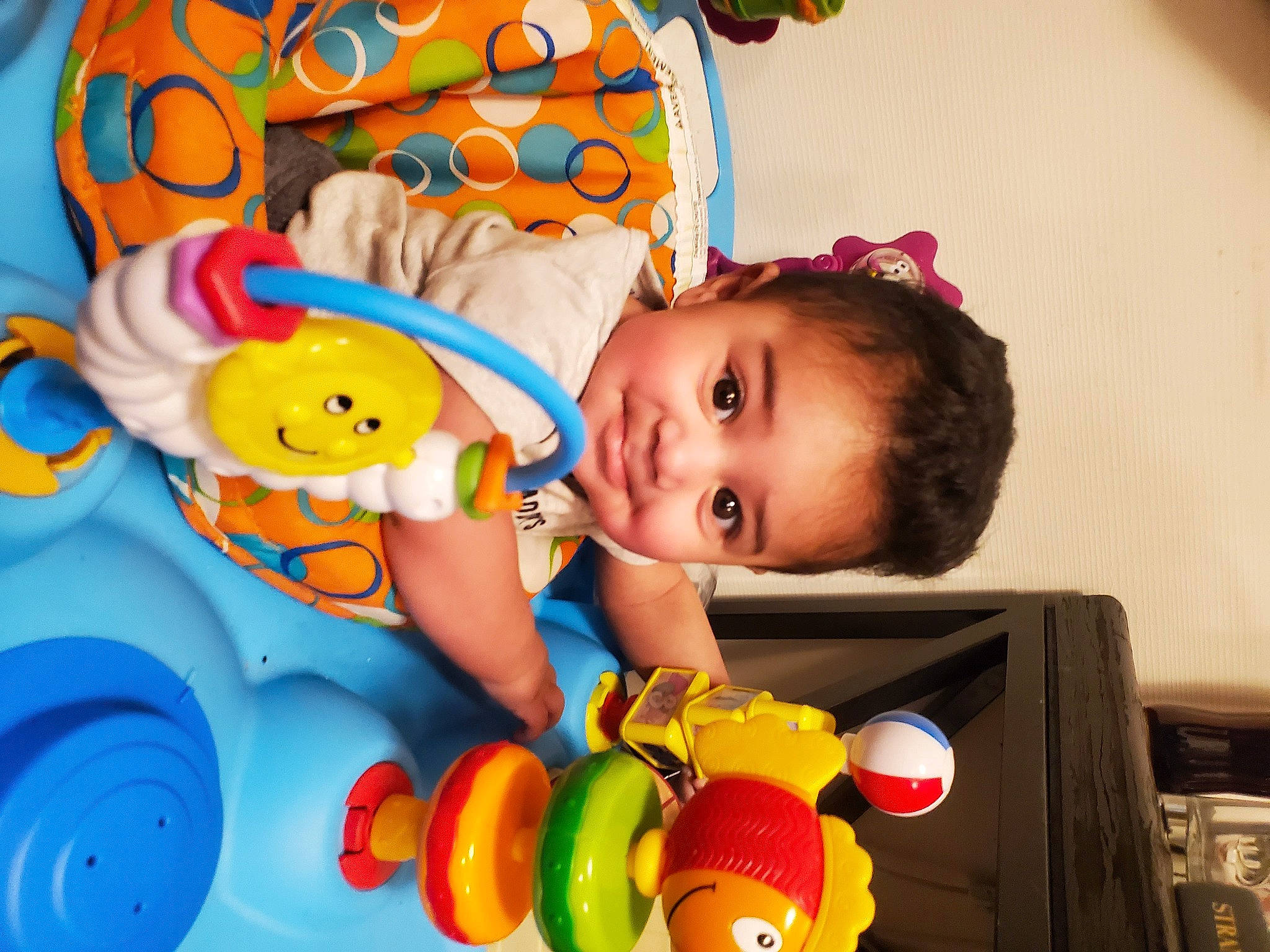 Malachi joined the competition — help win amazing prizes! baby, baby_playing_with_toys, baby_products, baby_toddler_clothing, baby_toys, cheek, child, fun, happy, leisure, pattern, person, plastic, play, product, room, smile, stuffed_toy, toddler, toy