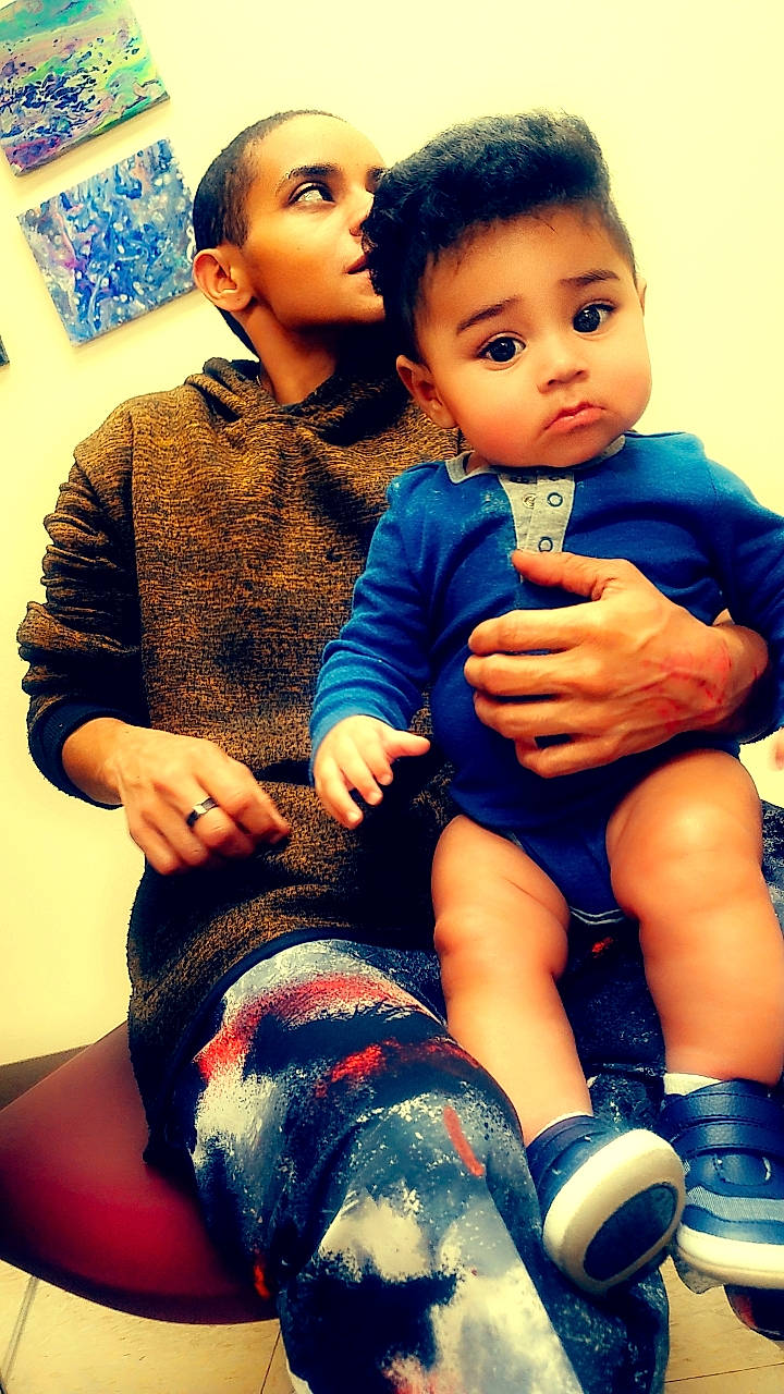 Malachi is registered to the contest to win money with this photo: baby_toddler_clothing, beauty, black, blue, child, cool, facial_expression, fun, gesture, hairstyle, happy, human, organ, people, person, photograph, skin, snapshot, standing, thigh