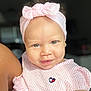 Kehlani joined the competition — help win amazing prizes! baby, child, smiling, headband, pink_clothing, striped_dress, heart_emblem, portrait, face, cute, infant, person, indoors, soft_lighting, closeup, happy, young_child, skin, apparel, ribbon