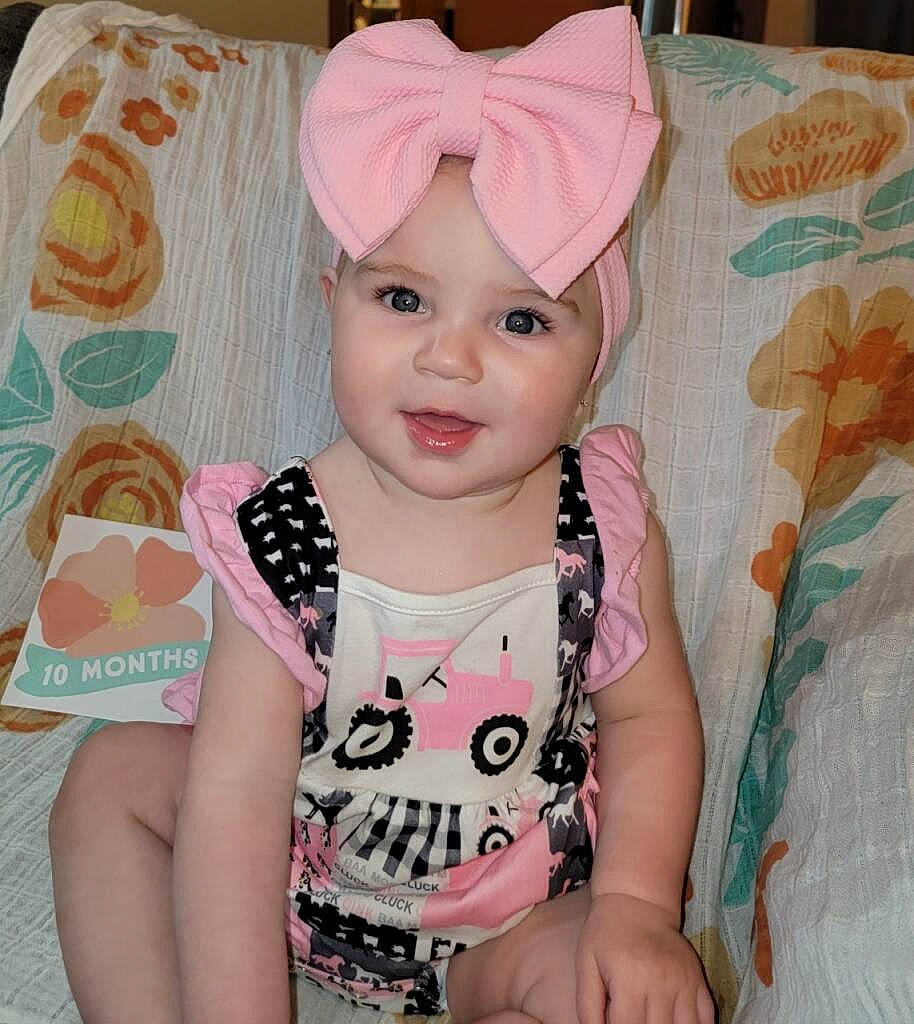 Azalea is registered to the contest to win money with this photo: baby, baby_toddler_clothing, cheek, child, cool, dress, eyelash, face, happy, head, headgear, headwear, iris, person, pink, skin, sleeve, smile, t_shirt, textile
