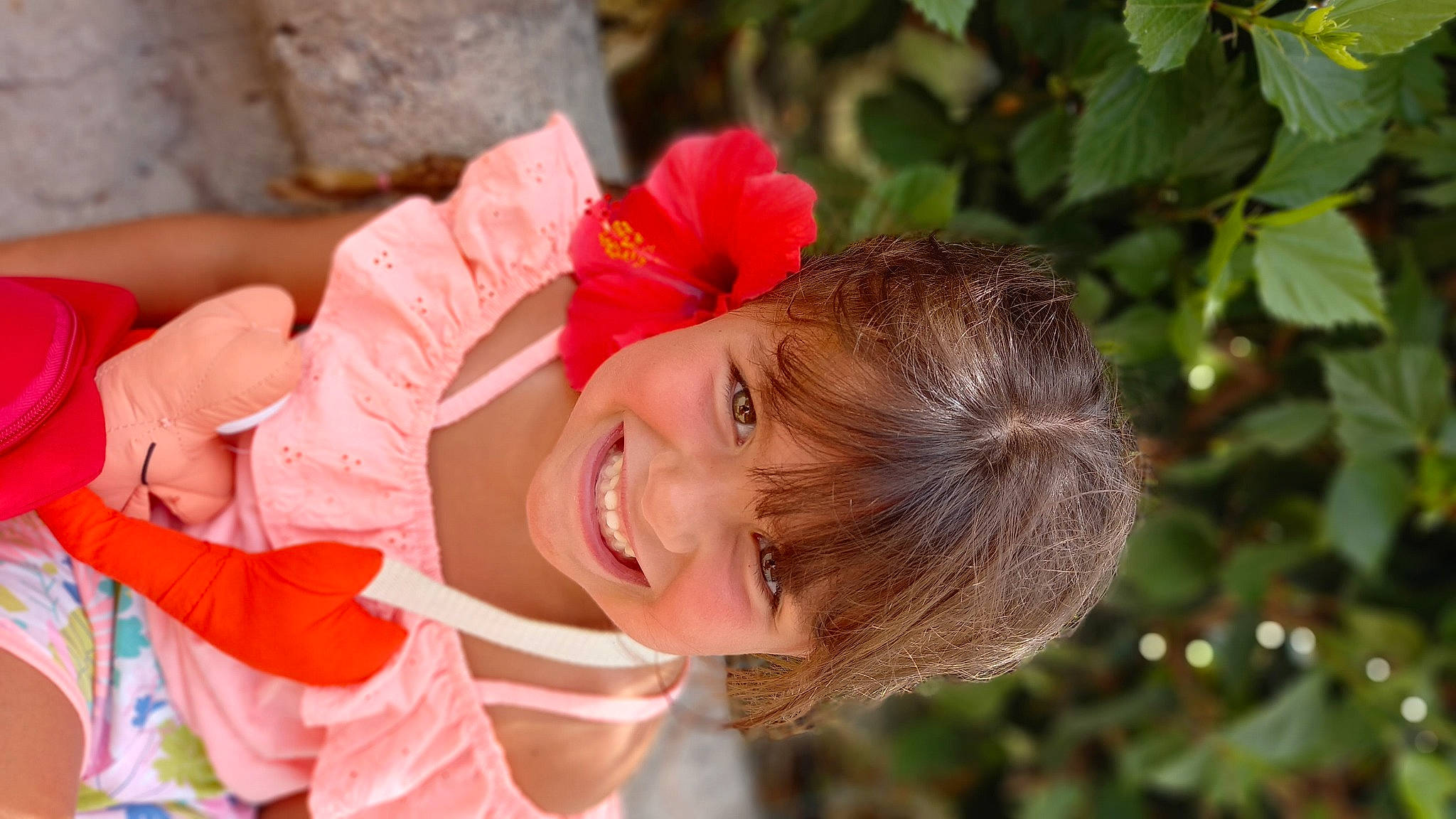 Lucie participe au concours pour gagner de l'argent avec cette photo : child, dress, eye, flower, fun, grass, happy, joy, leaf, leisure, lip, nature, peach, people_in_nature, person, petal, plant, portrait_photography, skin, smile