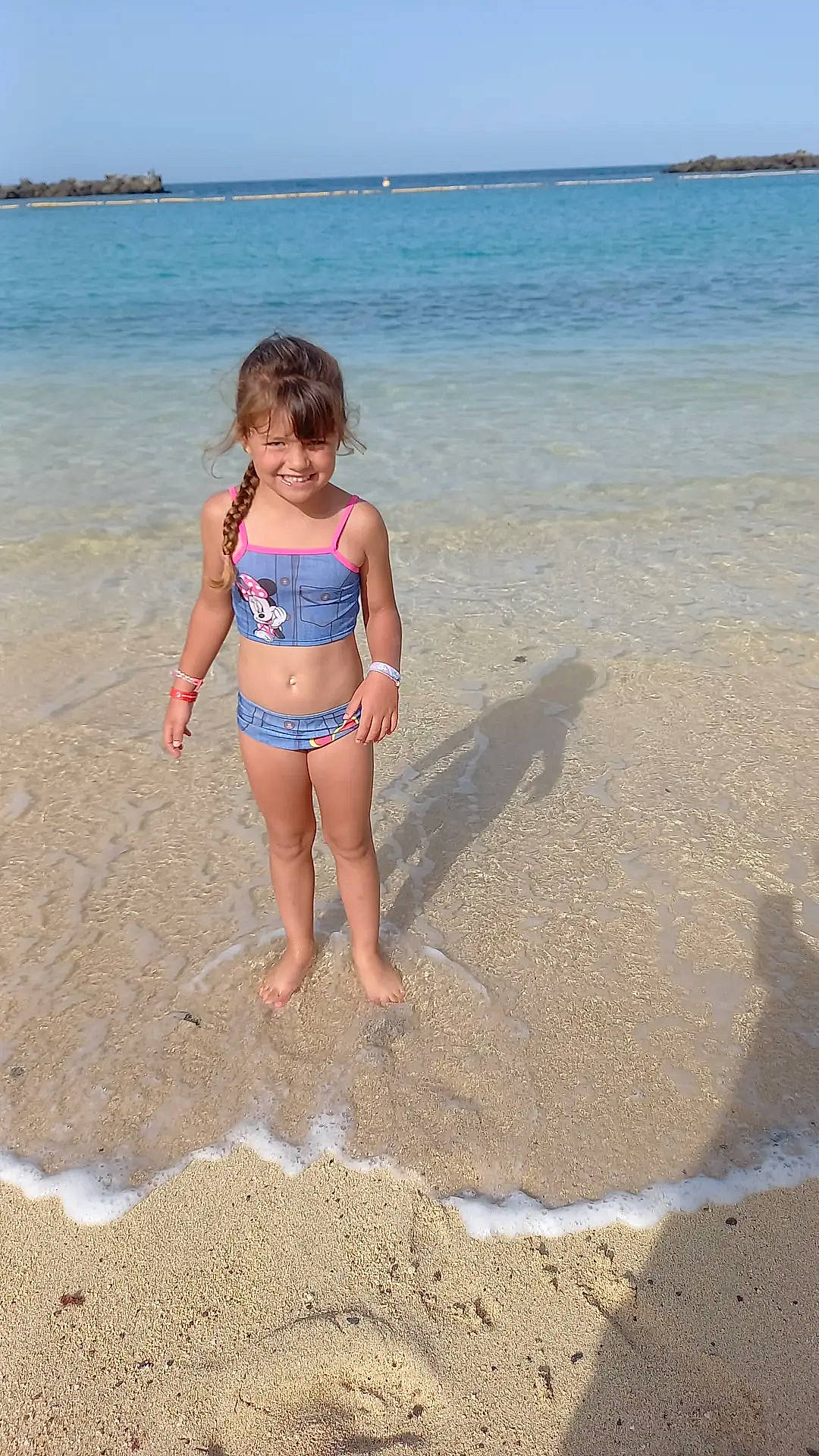 Lucie a rejoint le concours — aidez-le/la à gagner de superbes lots ! barefoot, beach, brassiere, chest, fun, joy, leg, leisure, people_on_beach, person, sand, sky, standing, summer, swimsuit_top, swimwear, thigh, toddler, trunk, undergarment