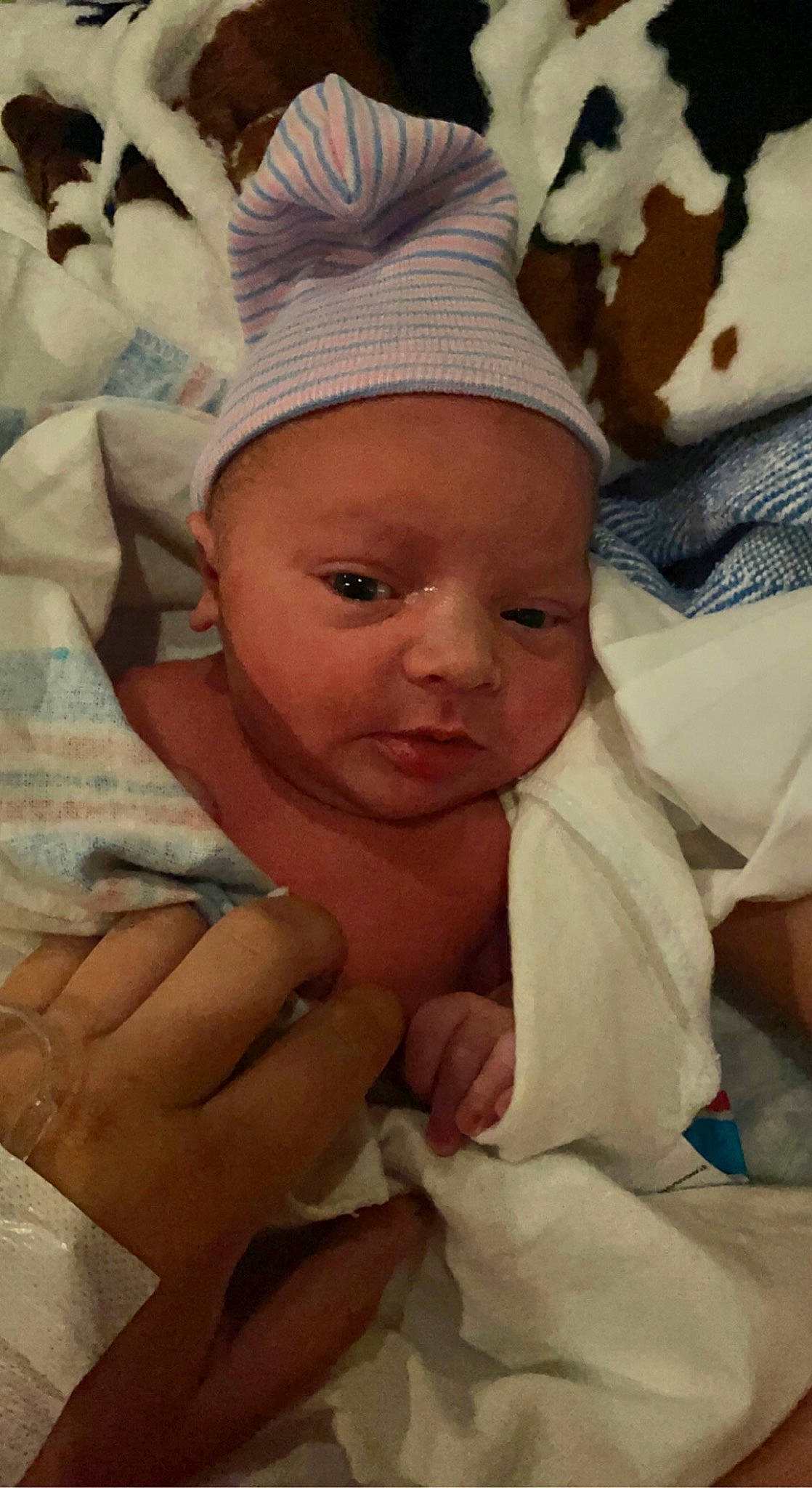 Gannon joined the competition — help win amazing prizes! baby, baby_sleeping, baby_toddler_clothing, cap, cheek, child, comfort, eye, face, finger, gesture, happy, hat, head, headwear, linens, nail, person, room, skin