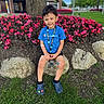 Ignacio joined the competition — help win amazing prizes! bandage, blue_shirt, boy, casual_clothing, child, crocs, daytime, flowers, grass, greenery, happy, lanyard, nature, outdoor, plant, portrait, rock, smile, spring, tree