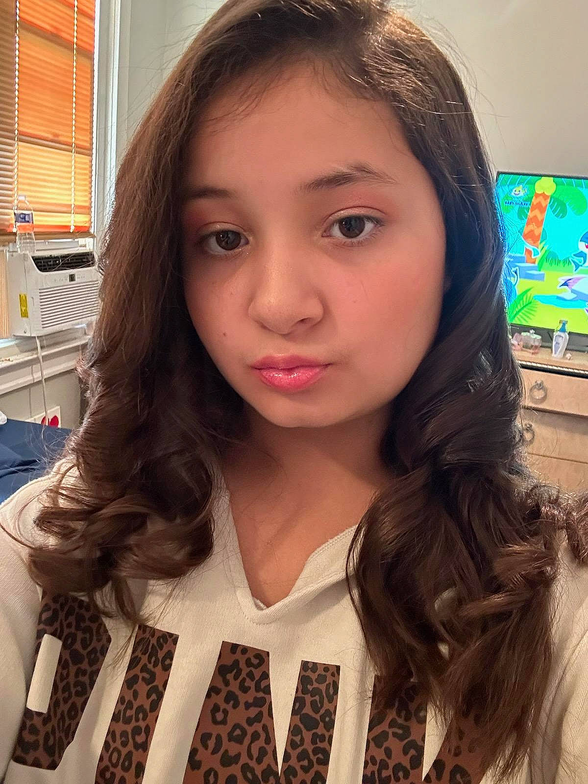 Alycia joined the competition — help win amazing prizes! black_hair, brown, cheek, cool, eye, eyebrow, eyelash, forehead, hairstyle, human, iris, jaw, layered_hair, lip, neck, nose, person, skin, sleeve, window