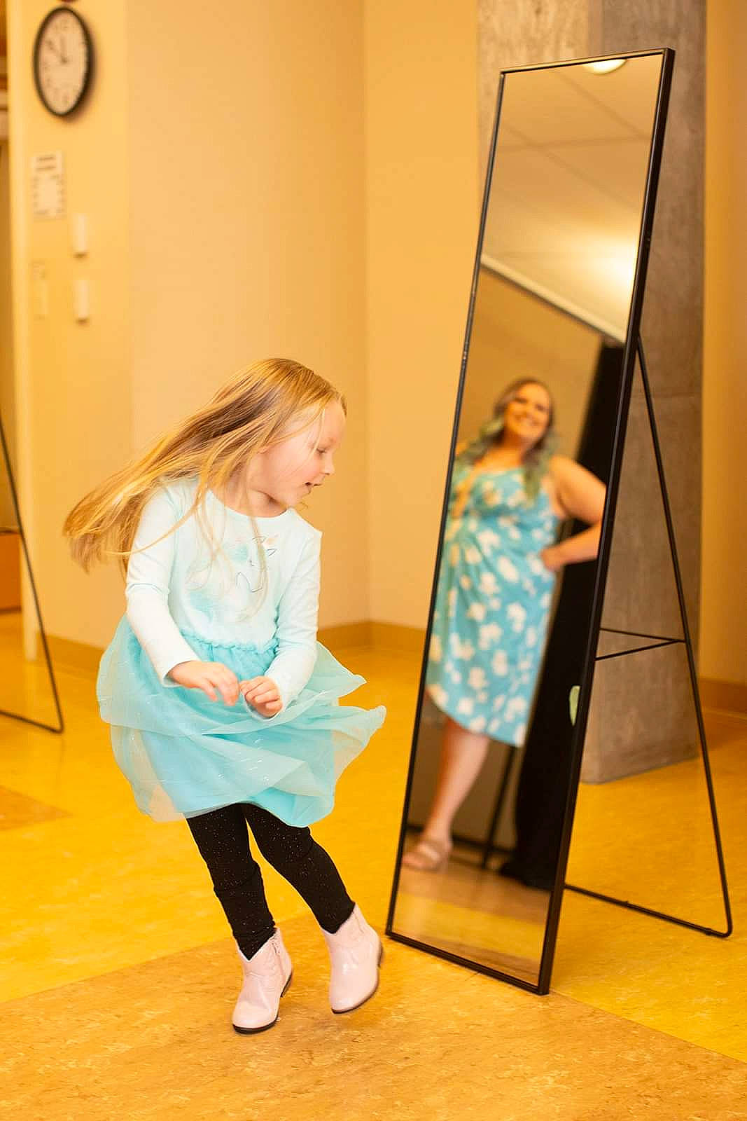 Bayleigh joined the competition — help win amazing prizes! baby_toddler_clothing, blurred, chair, clock, door, easel, electric_blue, event, flooring, fun, happy, joint, joy, knee, mirror, person, room, sleeve, sock, standing