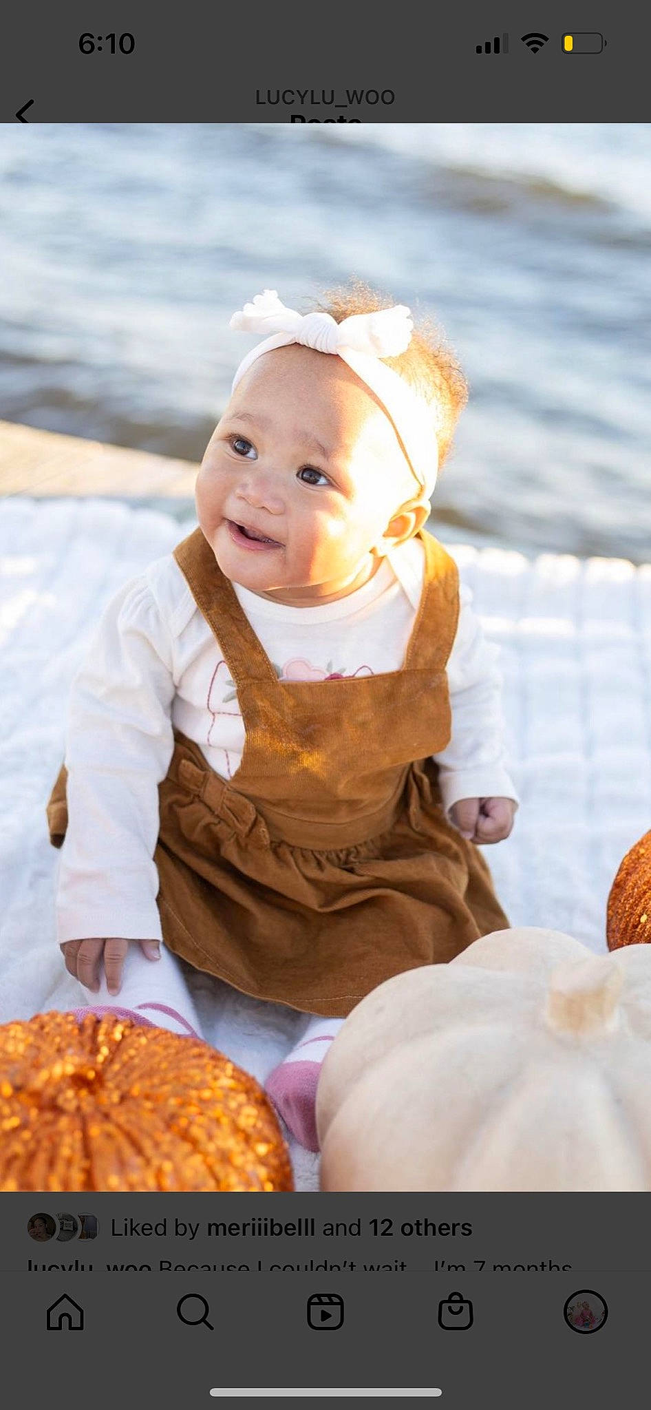 Luciana is registered to the contest to win money with this photo: baby, baby_toddler_clothing, beach, child, dress, finger_food, fun, happy, hat, ocean, orange, people_in_nature, person, portrait_photography, sand, sitting, smile, teddy_bear, toddler