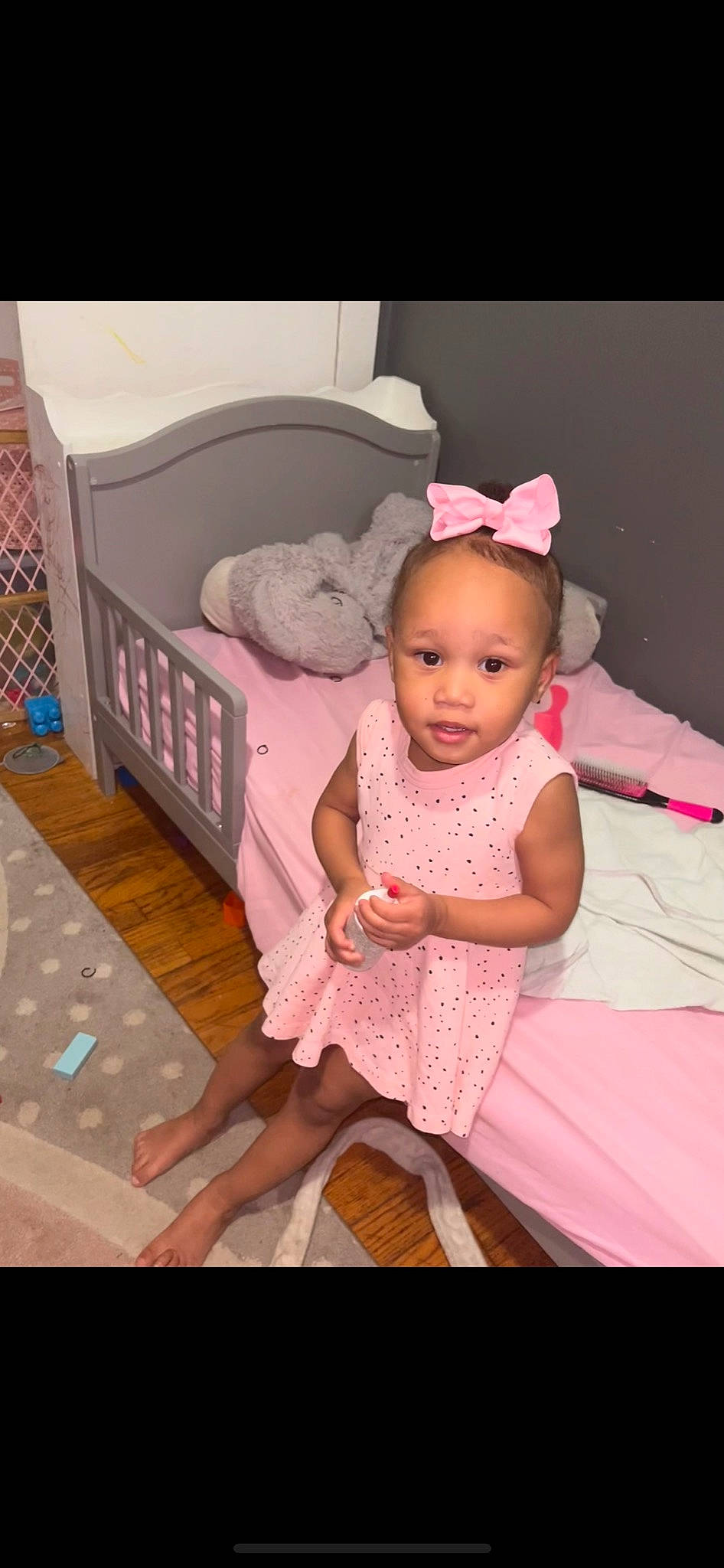 Luciana is registered to the contest to win money with this photo: baby, baby_toddler_clothing, cheek, comfort, dress, embellishment, eye, facial_expression, flash_photography, flooring, fun, happy, head, magenta, person, pink, purple, skin, sleeve, textile