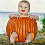baby, pumpkin, smiling, cute, infant, outdoor, fall, autumn, carved_pumpkin, fur_rug, happy, child, seasonal, nature, portrait, hands, legs, skin, blue_eyes, holiday