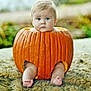 baby, pumpkin, outdoor, autumn, cute, child, blue_eyes, blanket, fall, seasonal, portrait, nature, sitting, infant, orange, harvest, holiday, costume, funny, plush