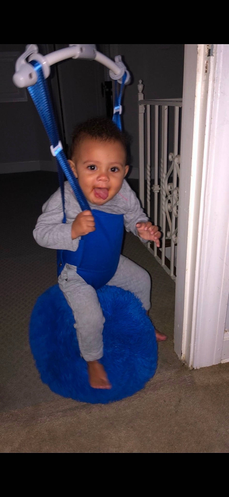 Lynette is registered to the contest to win money with this photo: baby, baby_toddler_clothing, blue, child, door, elbow, electric_blue, finger, floor, flooring, human_body, knee, leg, person, product, shoulder, sleeve, standing, t_shirt, toddler