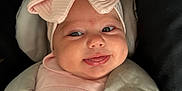 Thea-Rose is registered to the contest to win money with this photo: adorable, baby, baby_accessories, baby_girl, car_interior, car_seat, child, child_seat, closeup, clothing, cute, face, headwear, infant, infant_clothing, pink_bow, portrait, safety, seatbelt, smile