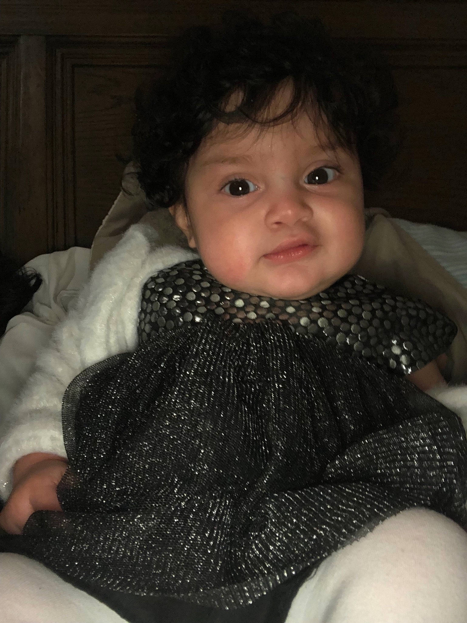 Emmery is registered to the contest to win money with this photo: baby, cheek, child, eye, face, head, iris, knitting, lip, neck, nose, person, sitting, skin, smile, toddler, wool