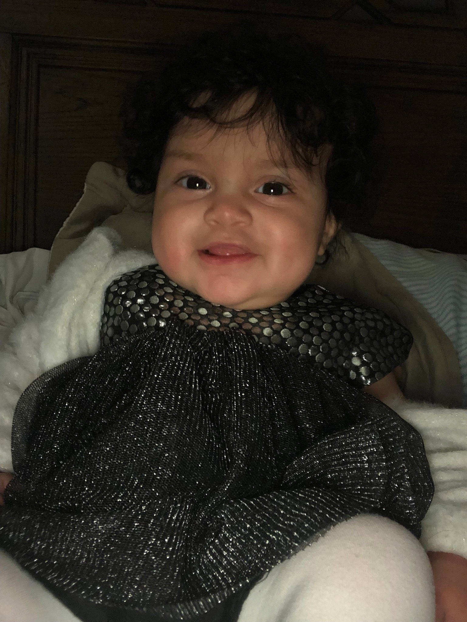 Emmery is registered to the contest to win money with this photo: baby, beauty, cheek, child, chin, eye, face, head, iris, knitting, lip, neck, nose, outerwear, person, sitting, skin, smile, toddler, wool