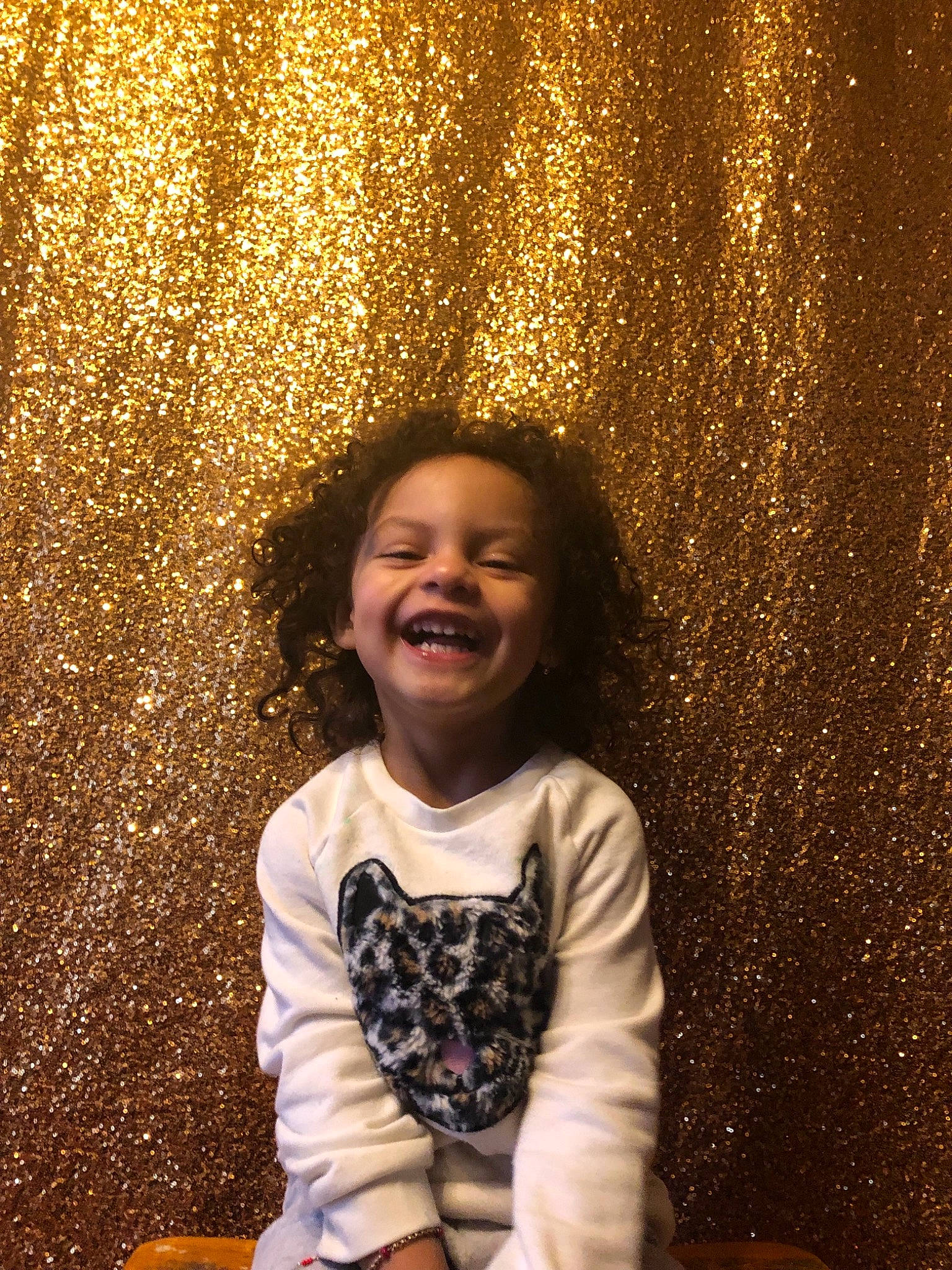 Gianna is registered to the contest to win money with this photo: child, face, facial_expression, family, fawn, fun, hair, hairstyle, happy, head, joy, laugh, people, person, photography, portrait, sitting, smile, standing, toddler