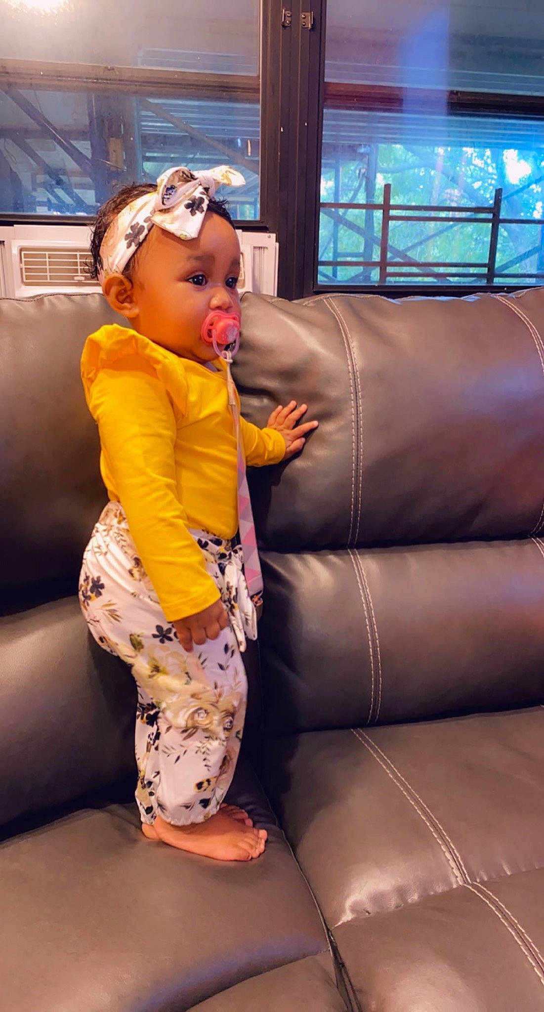 Nyrubi joined the competition — help win amazing prizes! child, couch, headwear, leg, person, toddler