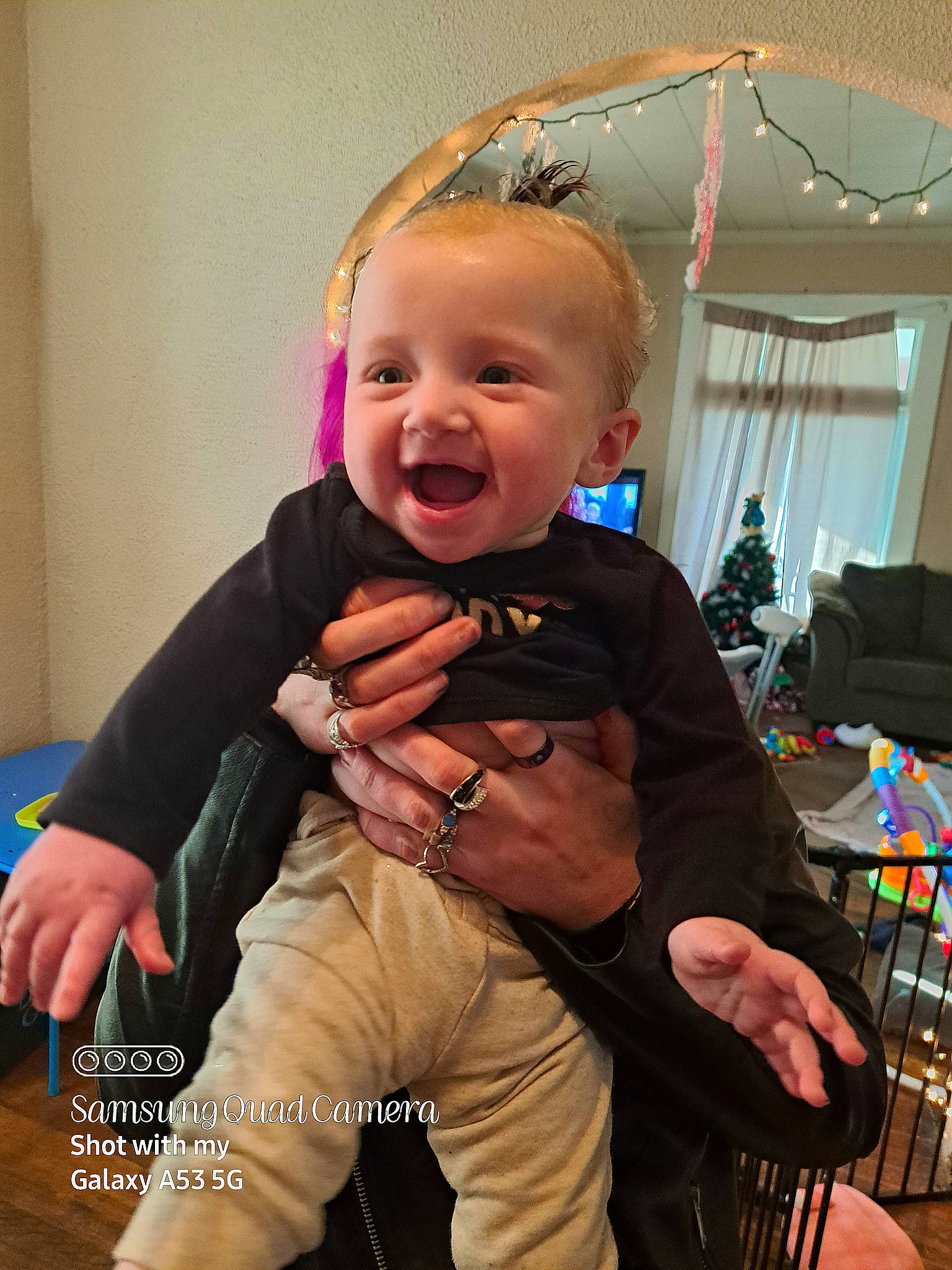 Arianna joined the competition — help win amazing prizes! baby, baby_toddler_clothing, chair, child, comfort, costume, curtain, event, fun, happy, lap, laugh, person, room, sitting, sleeve, smile, thigh, thumb, toddler