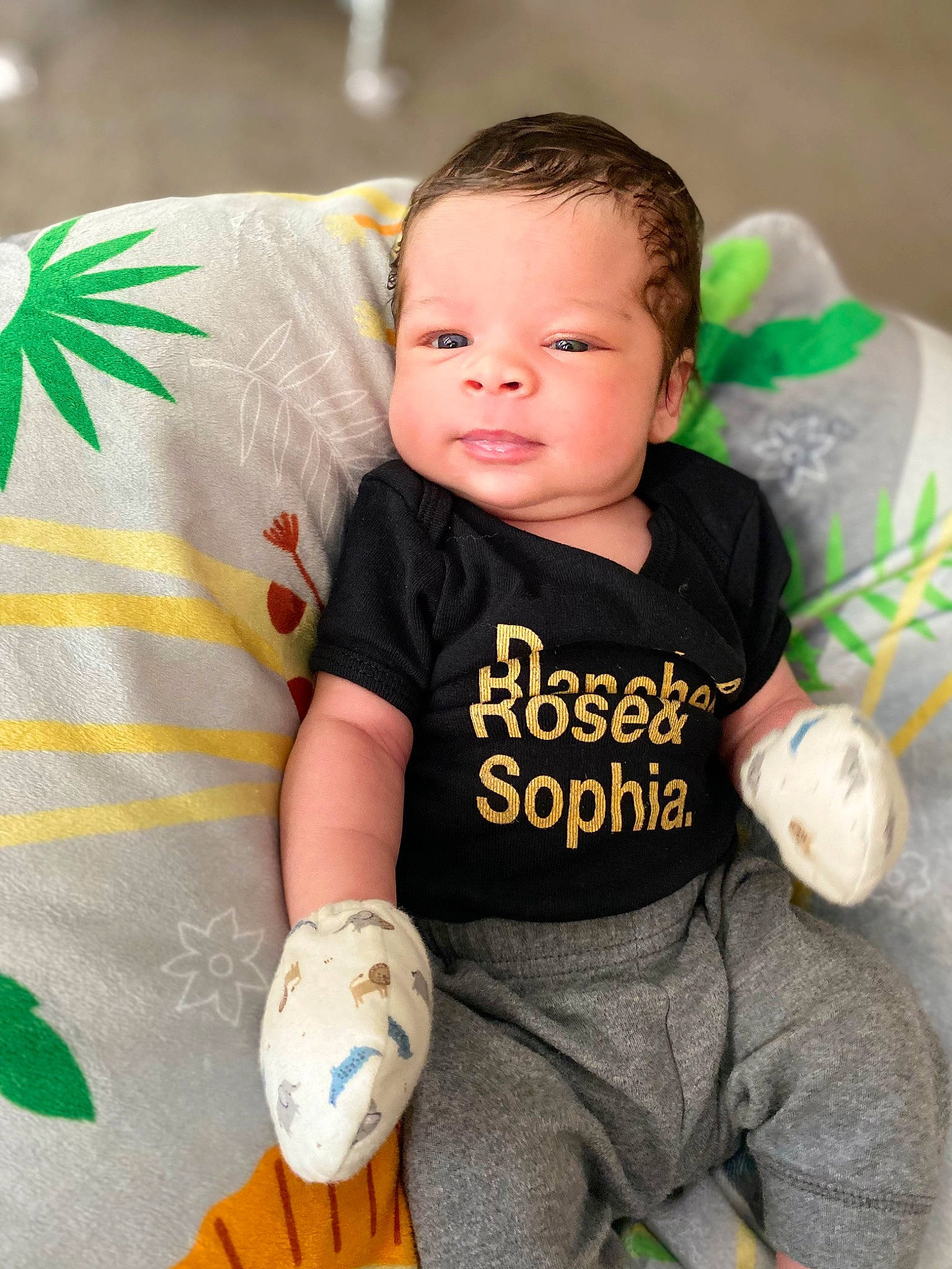 Koa joined the competition — help win amazing prizes! arm, baby, baby_toddler_clothing, ball, child, facial_expression, finger, fun, grass, hairstyle, hand, happy, people, person, sitting, skin, sleeve, smile, t_shirt, thumb