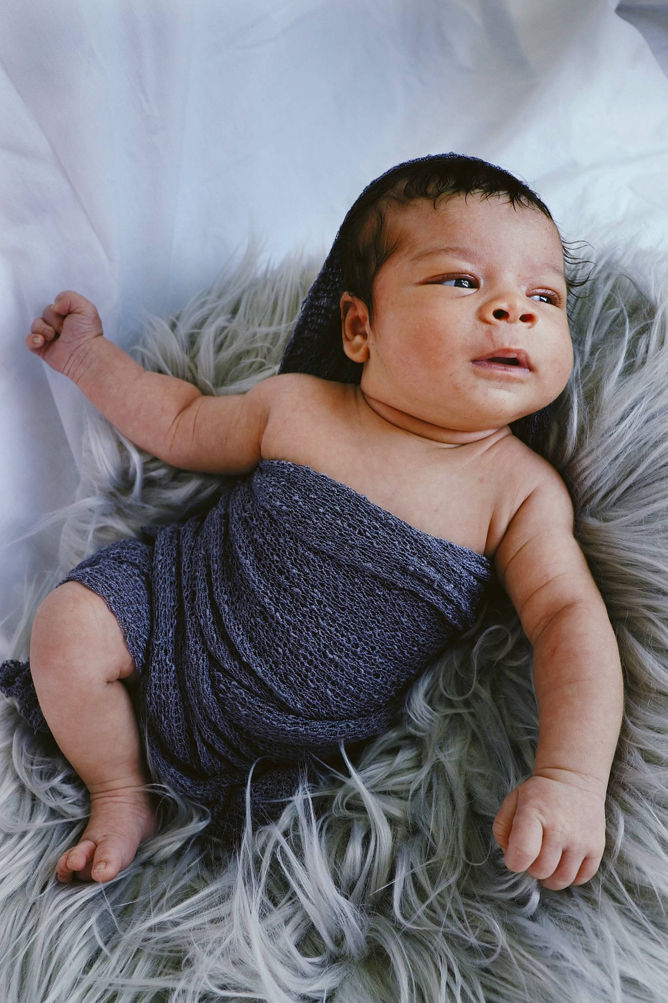 Koa joined the competition — help win amazing prizes! abdomen, arm, baby, baby_toddler_clothing, barefoot, child, comfort, flash_photography, grey, happy, headgear, linens, pattern, person, shoulder, sitting, skin, textile, thigh, toddler