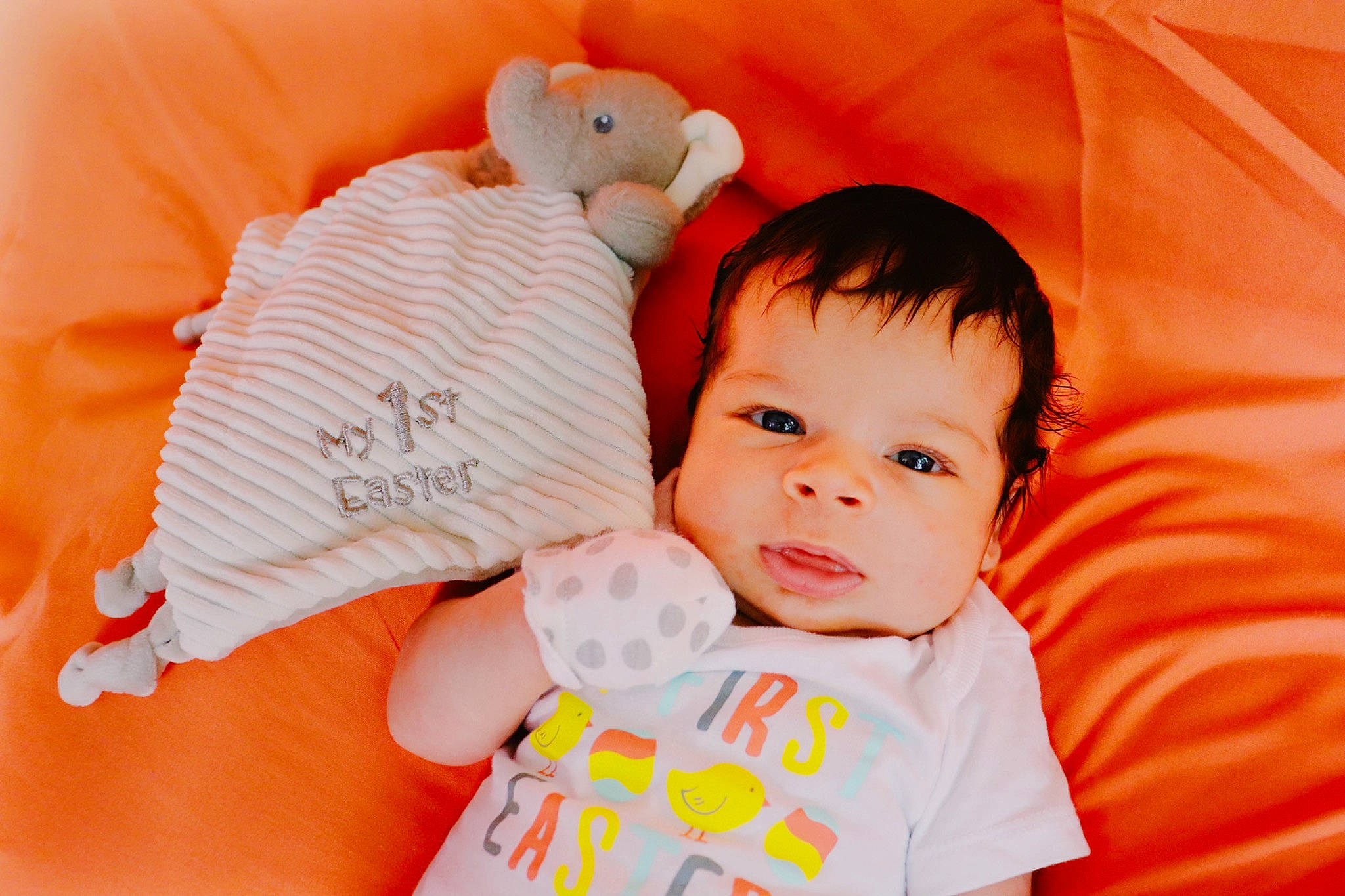 Koa joined the competition — help win amazing prizes! baby, baby_toddler_clothing, cheek, child, comfort, finger, happy, head, linens, mammal, nose, orange, person, pink, product, red, skin, textile, toddler, toy