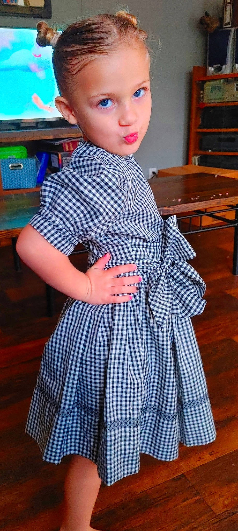 Emerielou is registered to the contest to win money with this photo: child, day_dress, dress, electric_blue, fashion_design, formal_wear, hairstyle, hand, human_leg, joint, one_piece_garment, pattern, person, plaid, shoulder, sleeve, tartan, thigh, trunk, waist