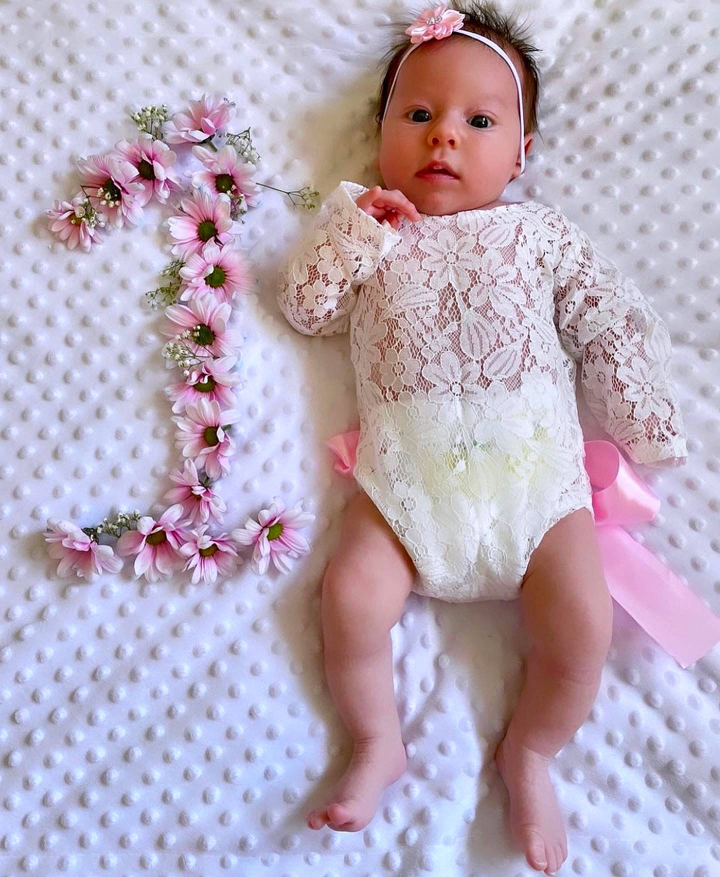 Siera joined the competition — help win amazing prizes! baby_toddler_clothing, beauty, cheek, child, doll, eye, eyelash, face, finger, head, headwear, iris, joint, lip, magenta, outerwear, pattern, person, pink, skin