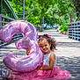 Eliana joined the competition — help win amazing prizes! balloon, bridge, celebration, child, curly_hair, footwear, girl, greenery, happy, nature, number_three, outdoor, park, pink_dress, portrait, ribbon, smiling, summer, sunlight, wooden_floor